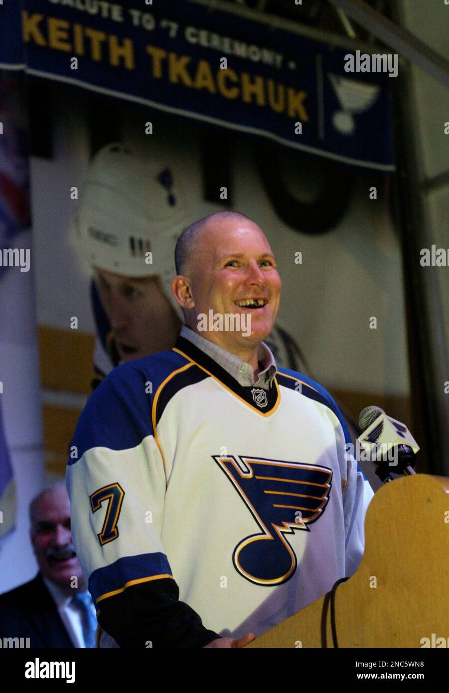 Former St. Louis Blues great Brett Hull (L) greets former teammate  defenseman Al MacInnis during a pre-game ceremony where the Blues retired  McInnis' number 2 jersey at the Savvis Center in St.