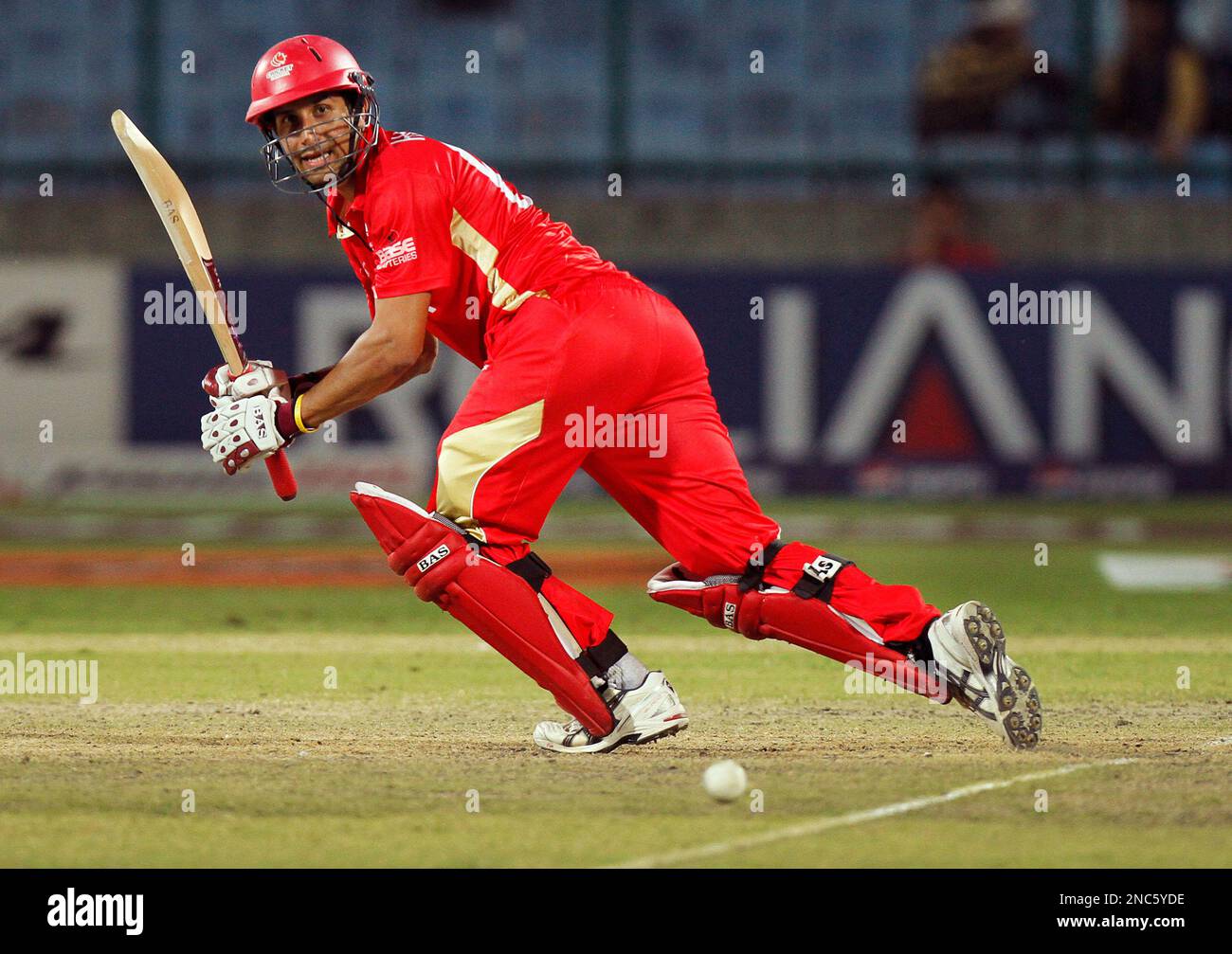 Canada's Jimmy Hansra bats in the Cricket World Cup Group A match between  Canada and Kenya in the in New Delhi, India, Monday, March 7, 2011. (AP  Photo/Gurinder Osan Stock Photo - Alamy