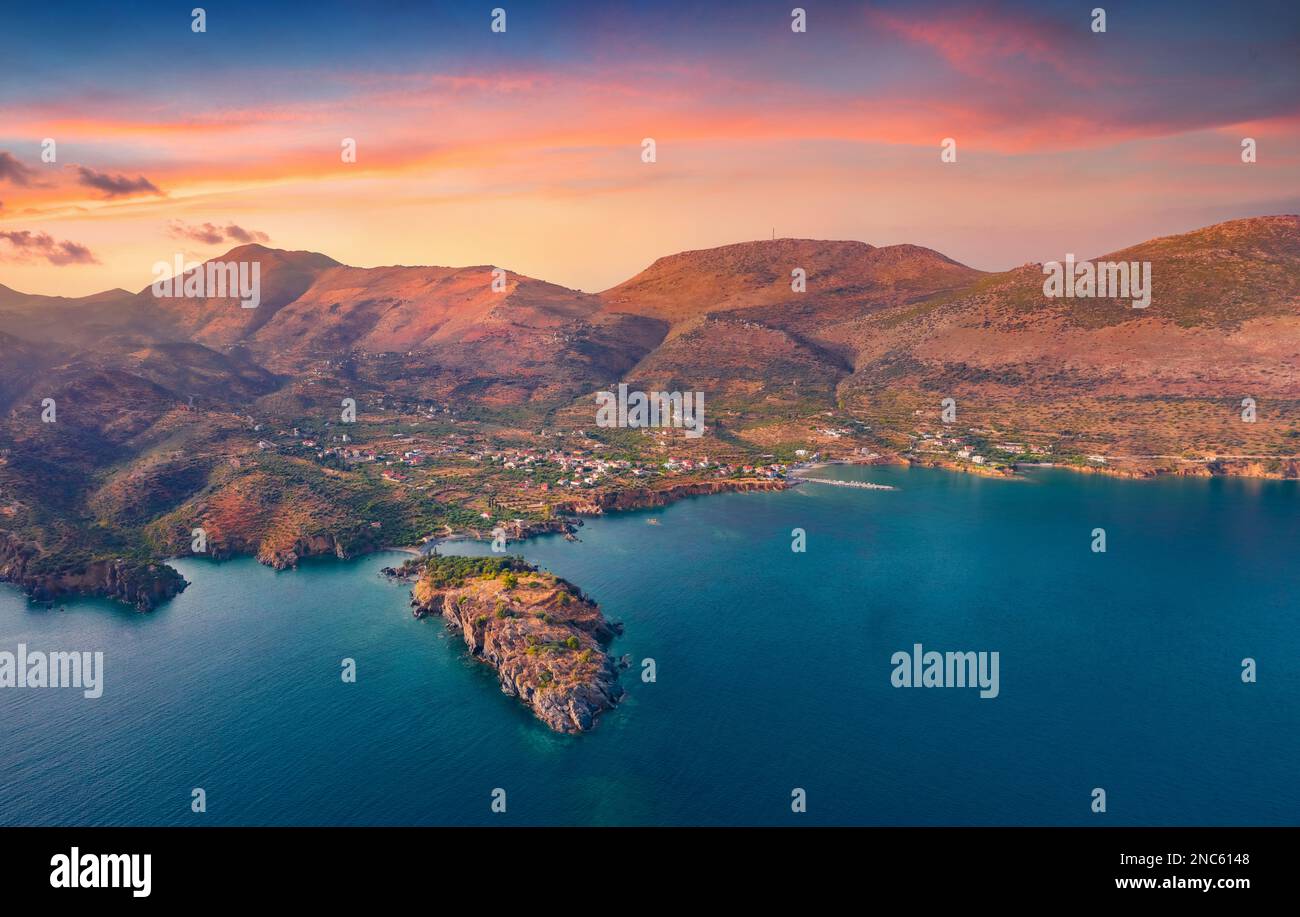 Unbelievable view from flying drone of Purpose or Double beach, Kotronas town location. Superb evening seascape of Mediterranean sea, Peloponnese peni Stock Photo