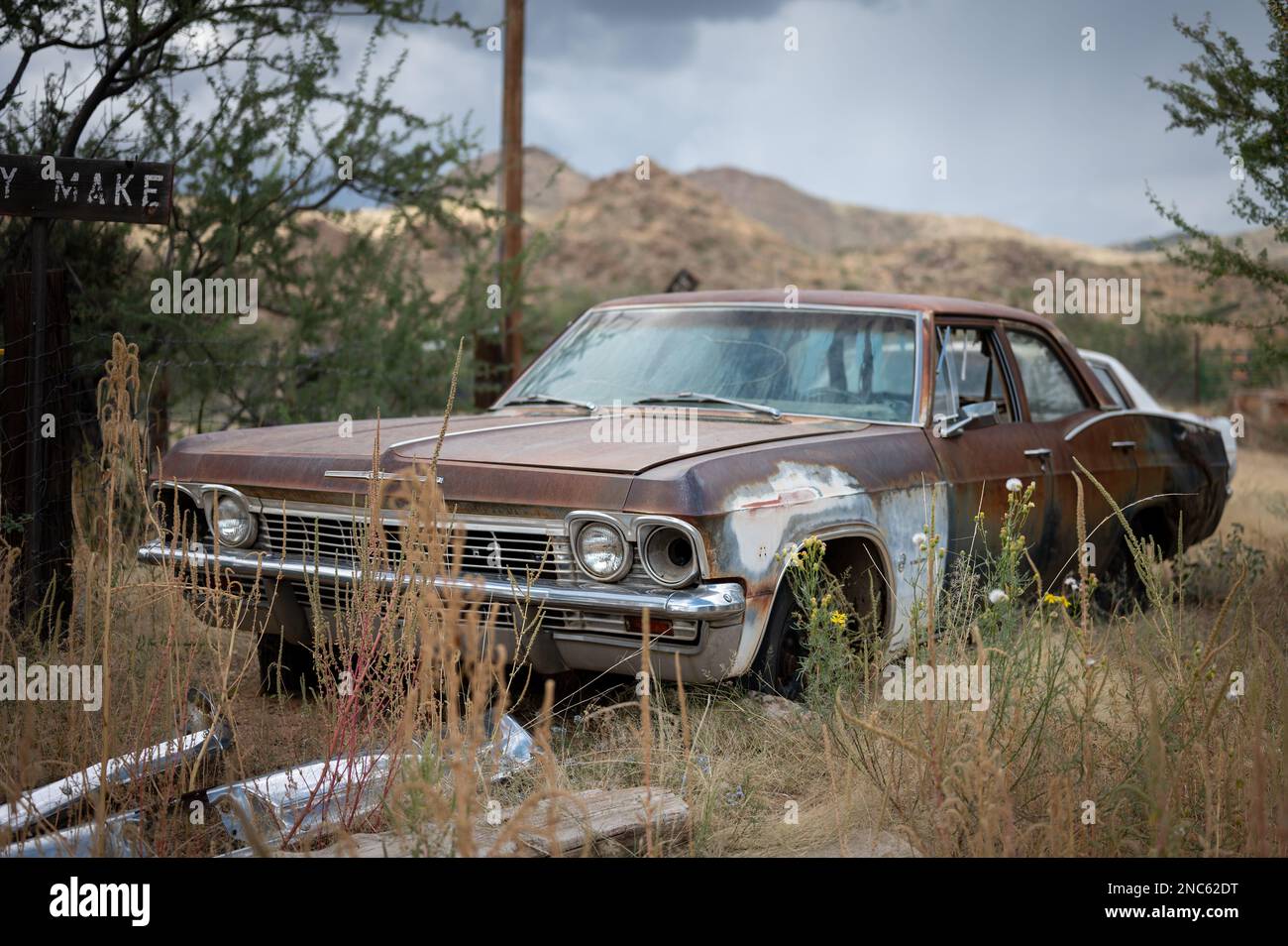 An old fourth generation Chevrolet Biscayne abandoned in a remote countryside Stock Photo
