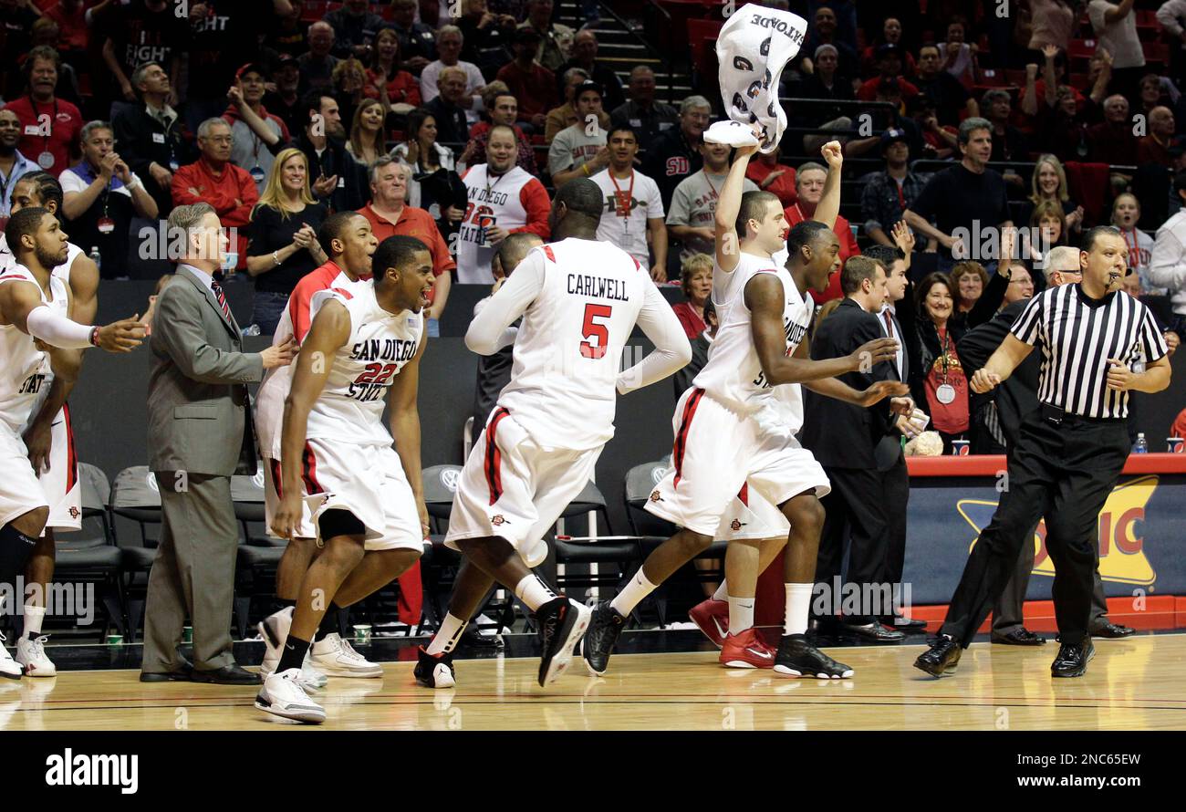 San Diego State players run off the bench after San Diego State beat