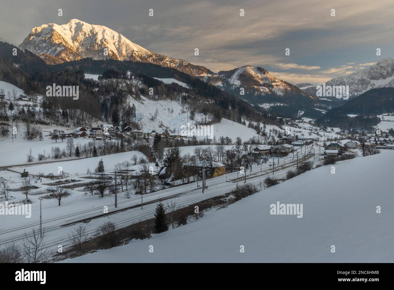 Winter evening in Spital am Pyhrn in Austria with railway small station Stock Photo