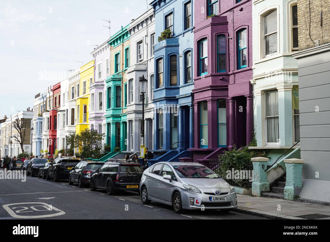 Colorful terrace houses on residential street in Notting Hill, London, England United Kingdom UK Stock Photo