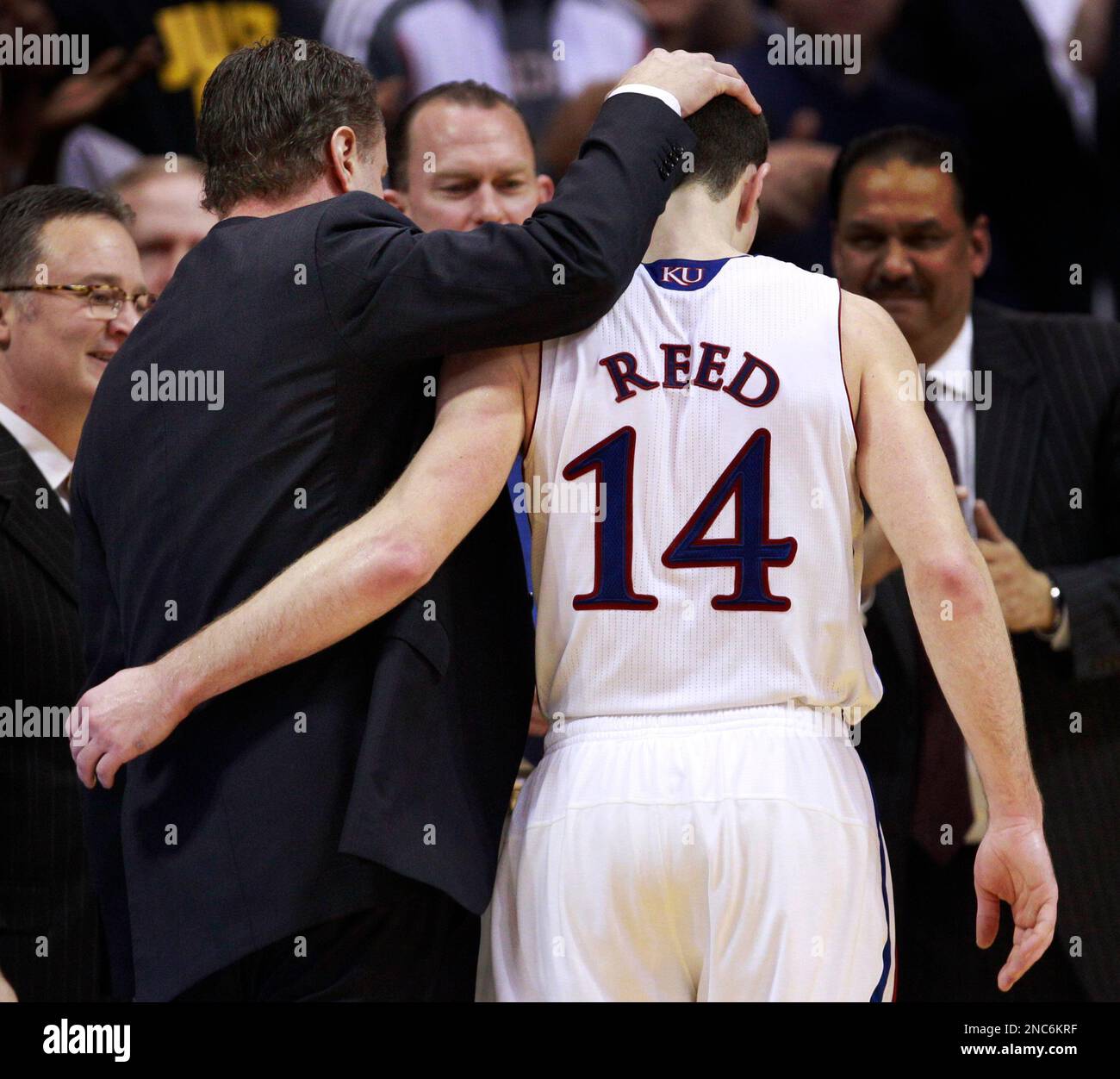 Tyrel Reed Kansas coach Bill Self, left, pats the head of senior guard Tyrel Reed ...