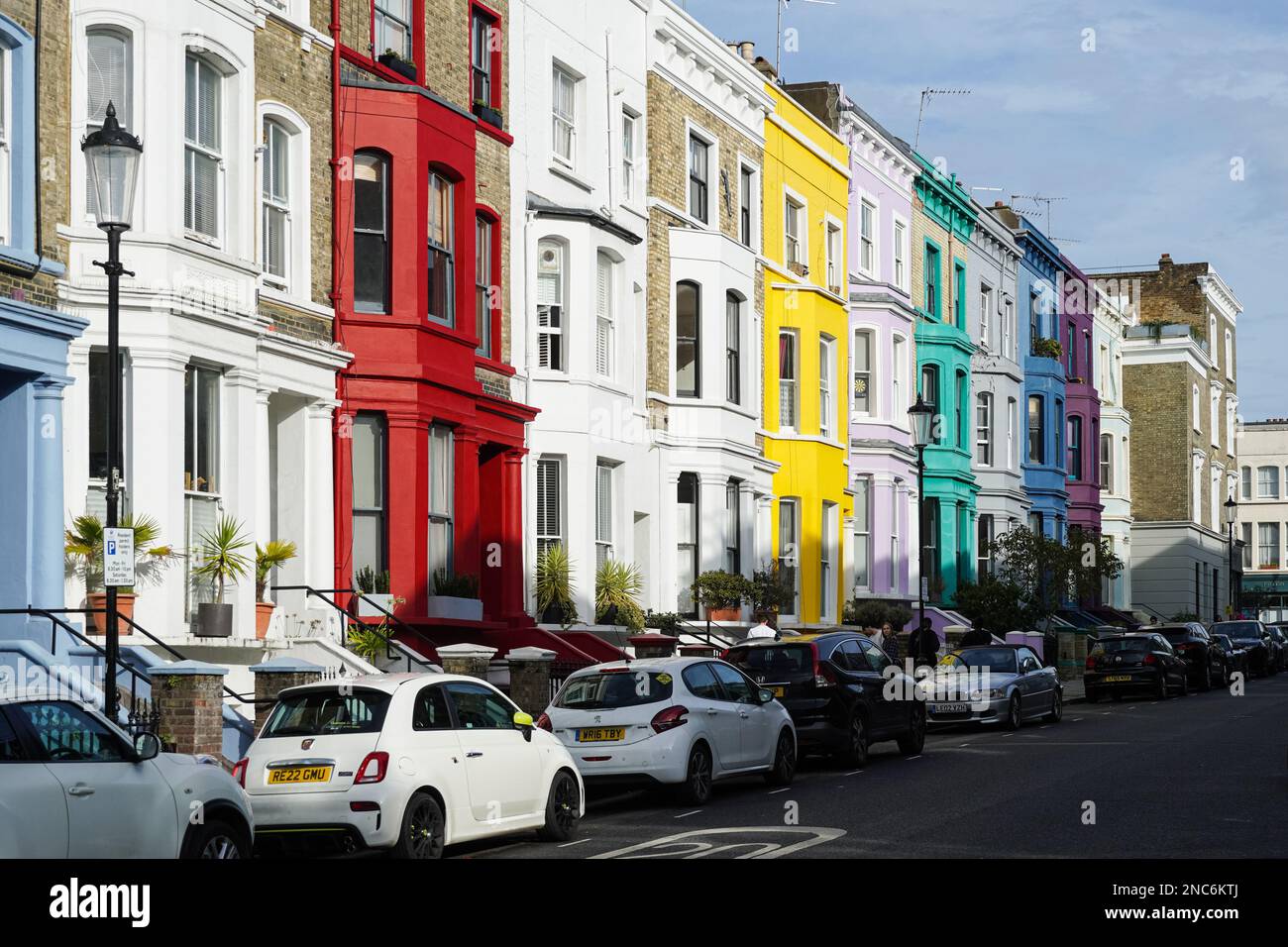 Colorful terrace houses on residential street in Notting Hill, London
