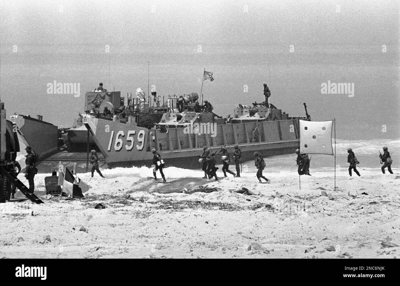 Egyptian Soldiers Pour Out Of A U S Landing Craft On A Beach At El egyptian-soldiers-pour-out-of-a-u-s-landing-craft-on-a-beach-at-el