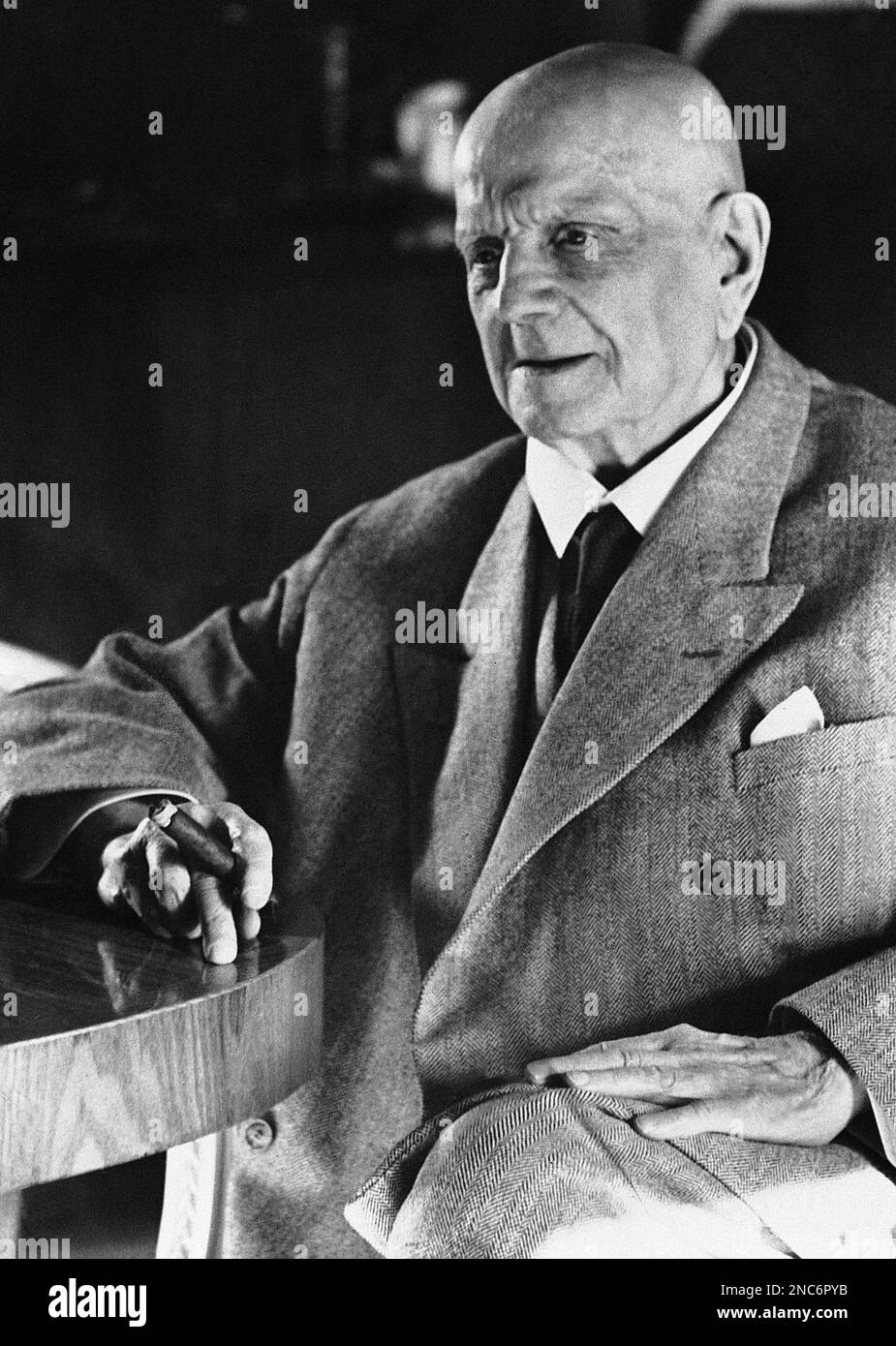 Jean Sibelius is shown holding a cigar on Nov. 28, 1955. The portrait