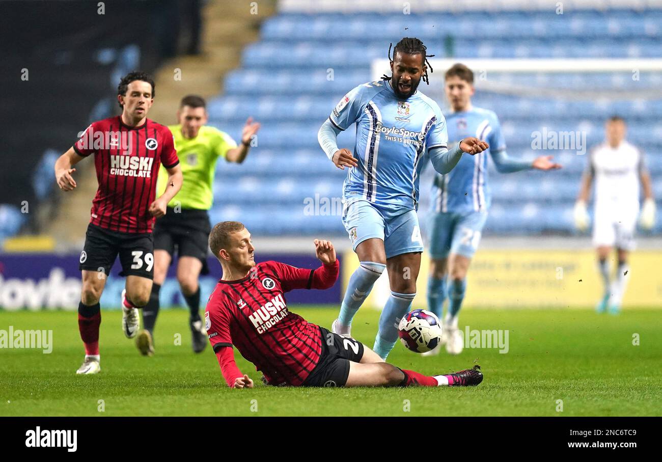 Millwall's George Saville tackles Coventry City's Kasey Palmer during the Sky Bet Championship match at the Coventry Building Society Arena, Coventry. Picture date: Tuesday February 14, 2023. Stock Photo