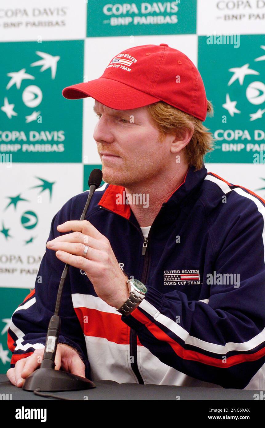 U.S. tennis team captain Jim Courier attends a press conference before