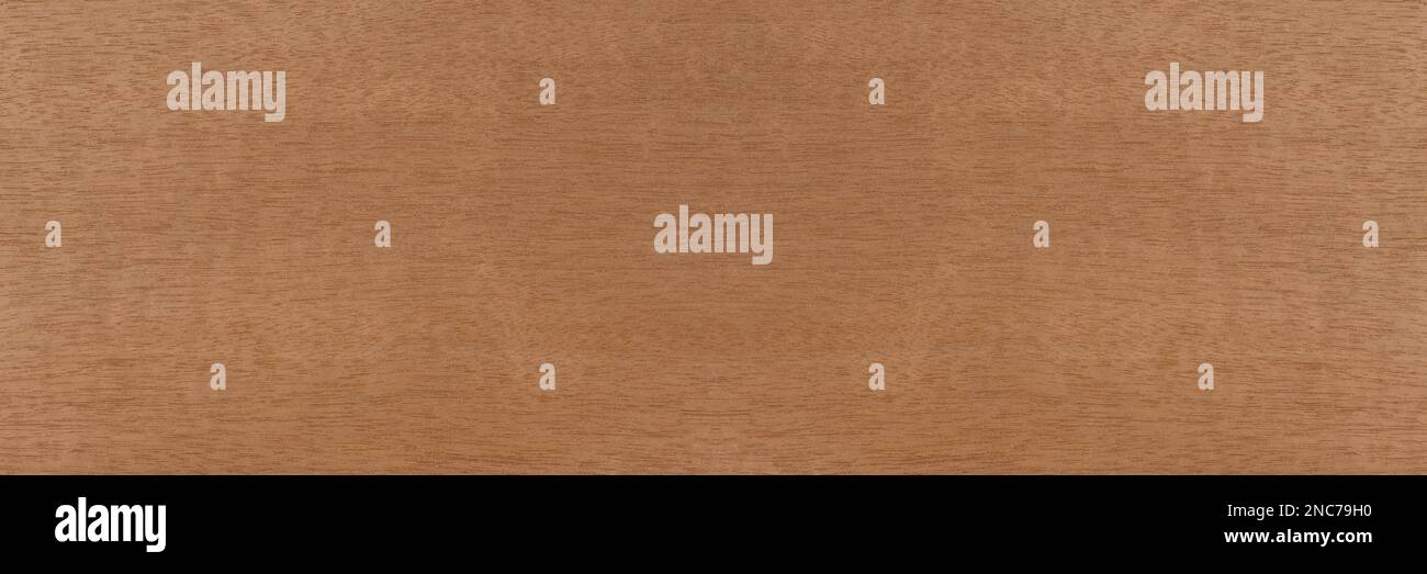 Wood with fine horizontal texture. Anigre wood texture with a reddish