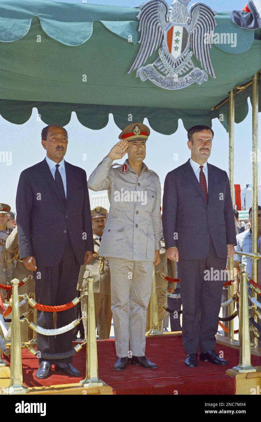 Col. Moammar Gadhafi with Gen. Hafez Assad of Syria and Anwar Sadat of ...