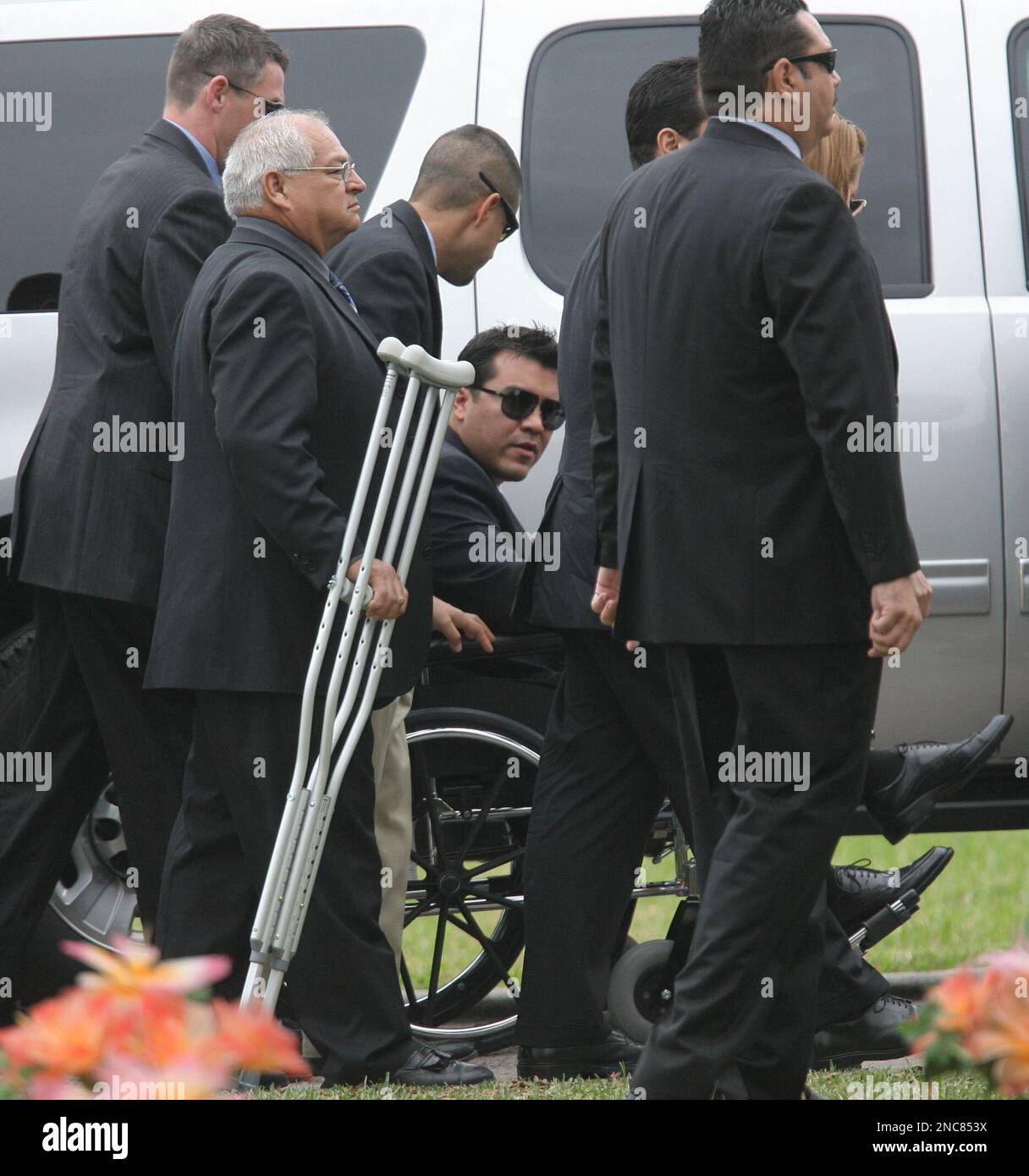 Immigration Customs Enforcement agent Victor Avila (dark glasses