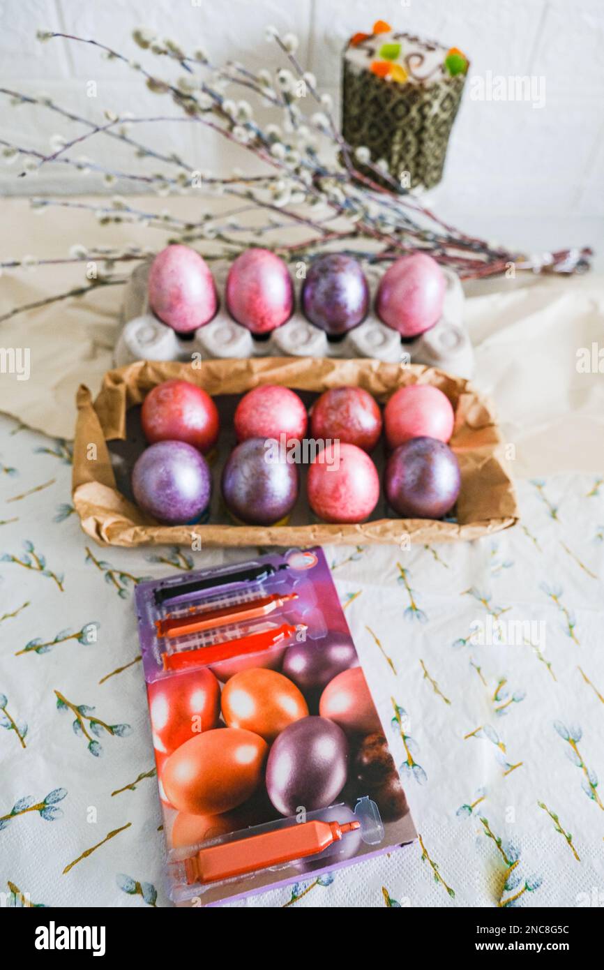 Easter eggs and willow branches on light background Stock Photo - Alamy