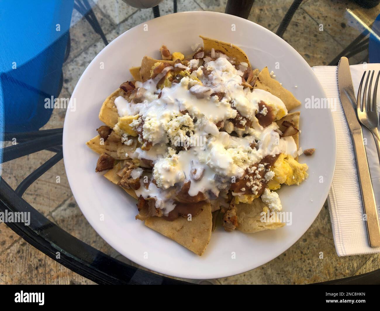 Chilaquiles in a restaurant in Oaxaca, Mexico. It is a traditional Mexican breakfast dish made