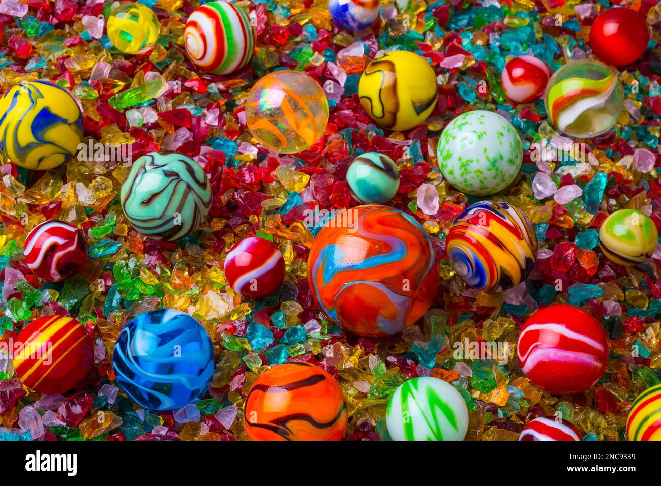 Marbles On Crushed Glass Stock Photo