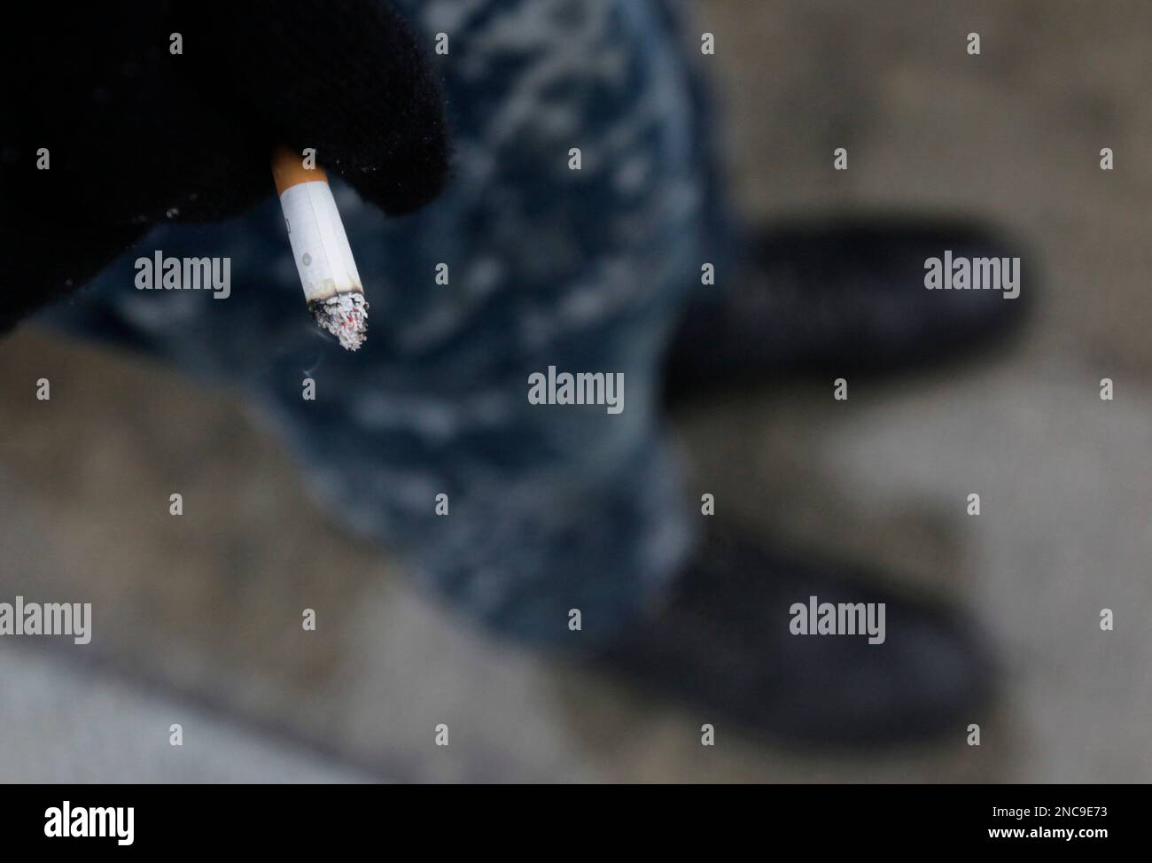 In this photo taken Friday, Feb. 11, 2011, a crew member from the USS