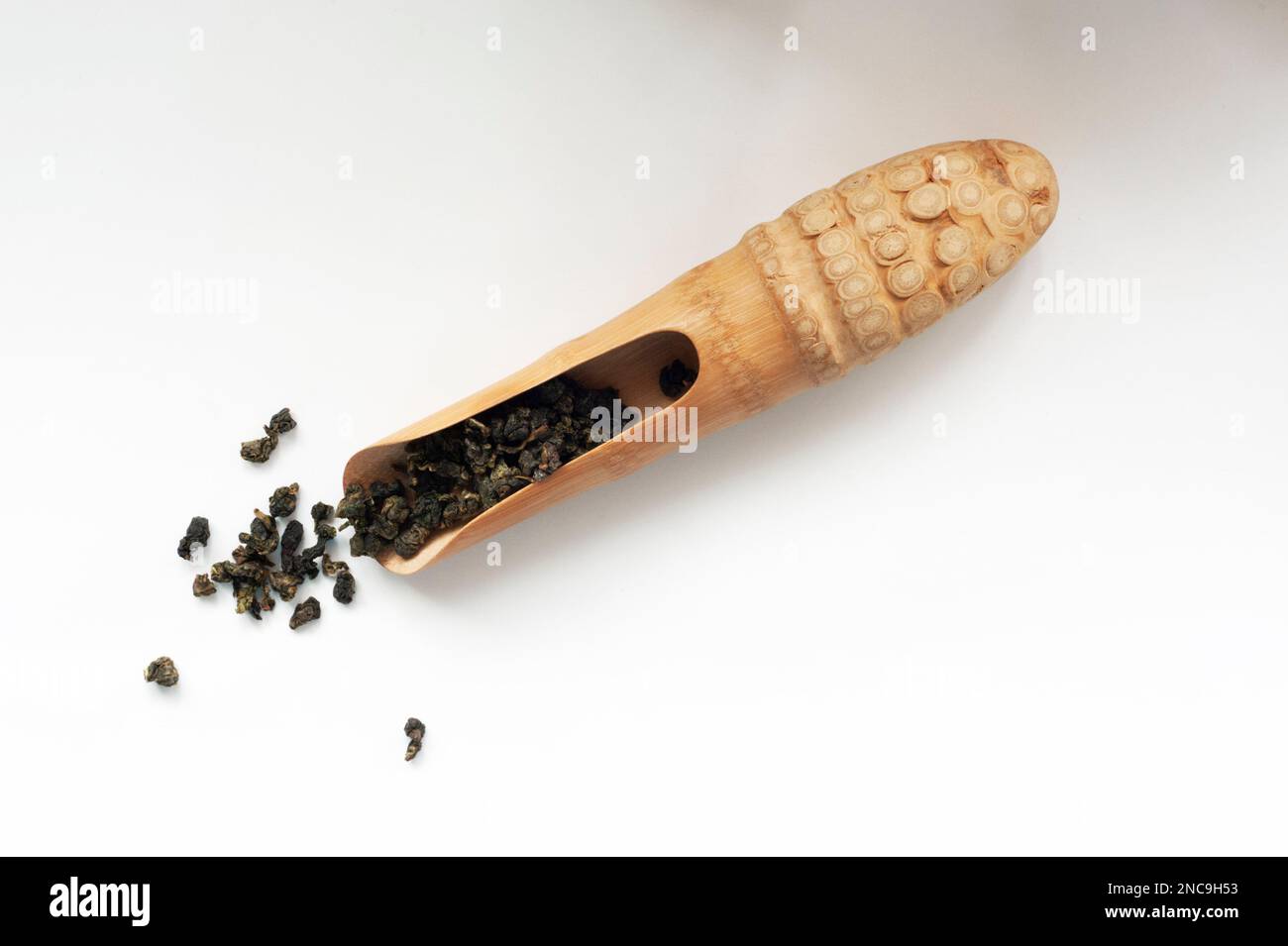 Tea in a Chinese style tea scoop carved from the roots of a bamboo