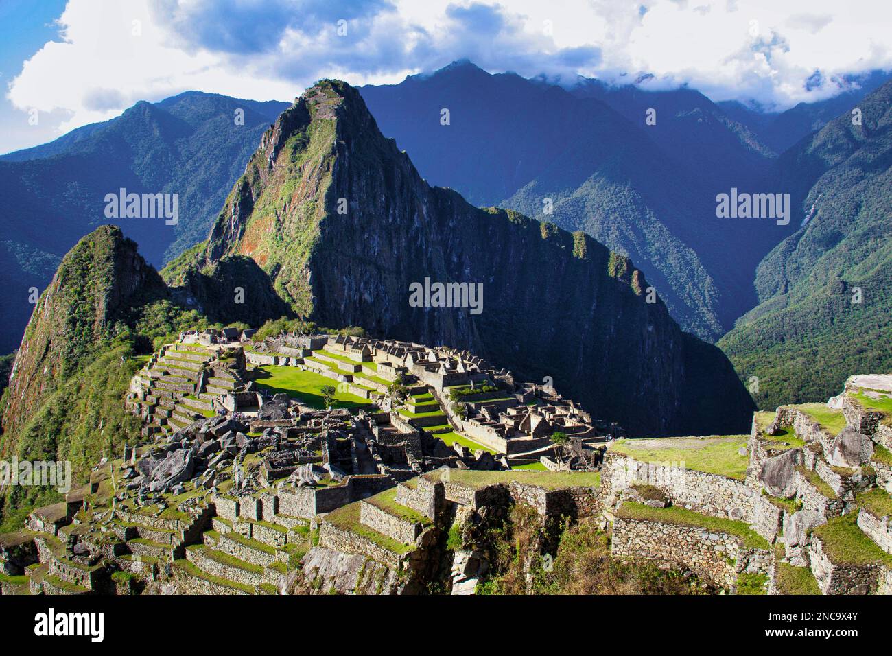 The ancient Inca city of Machu Picchu sits high in the Andes Mountains