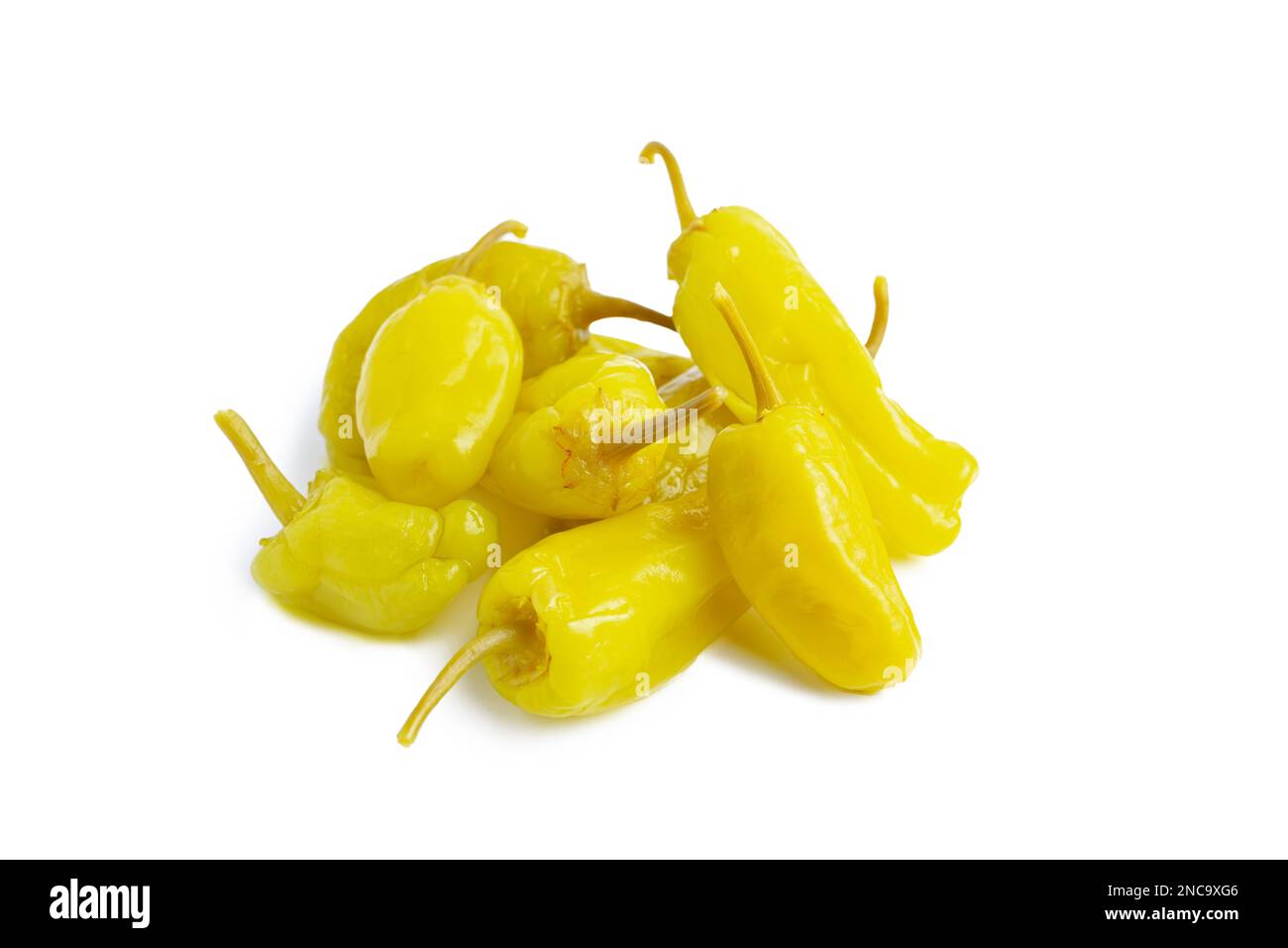 Pile of pickled yellow peppers, pepperoncini or friggitelli isolated on