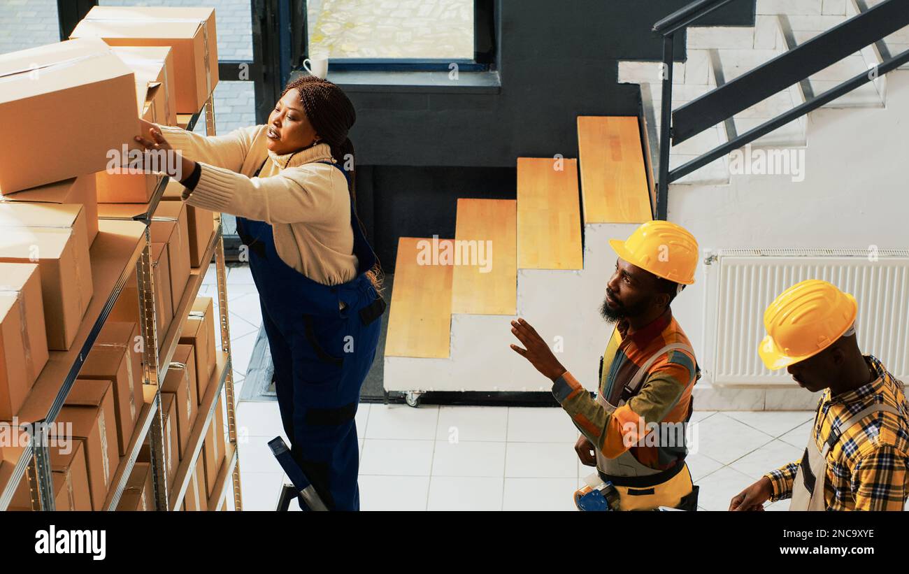 African american people packing products hi-res stock photography and ...