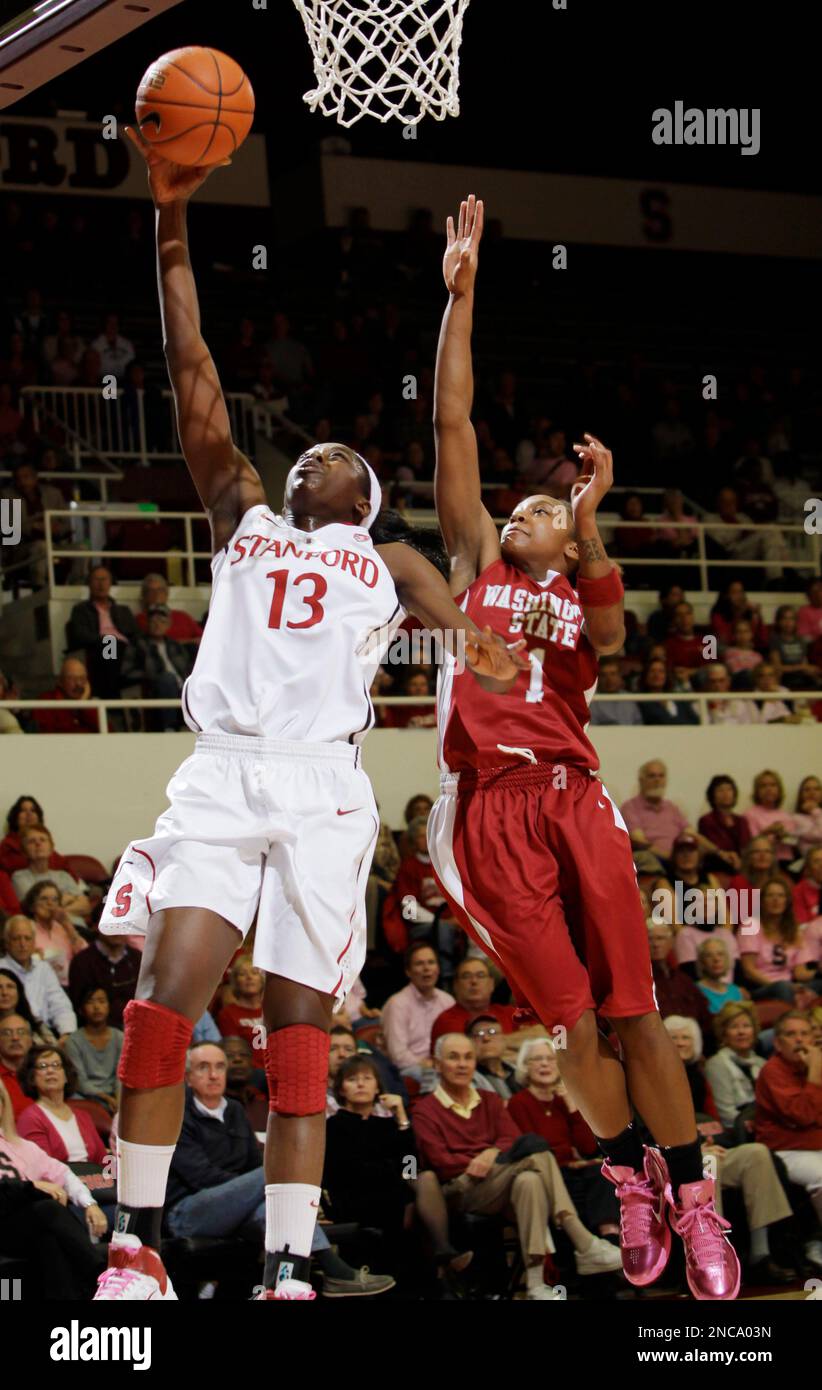 Stanford forward Chiney Ogwumike (13) scores in front of Washington