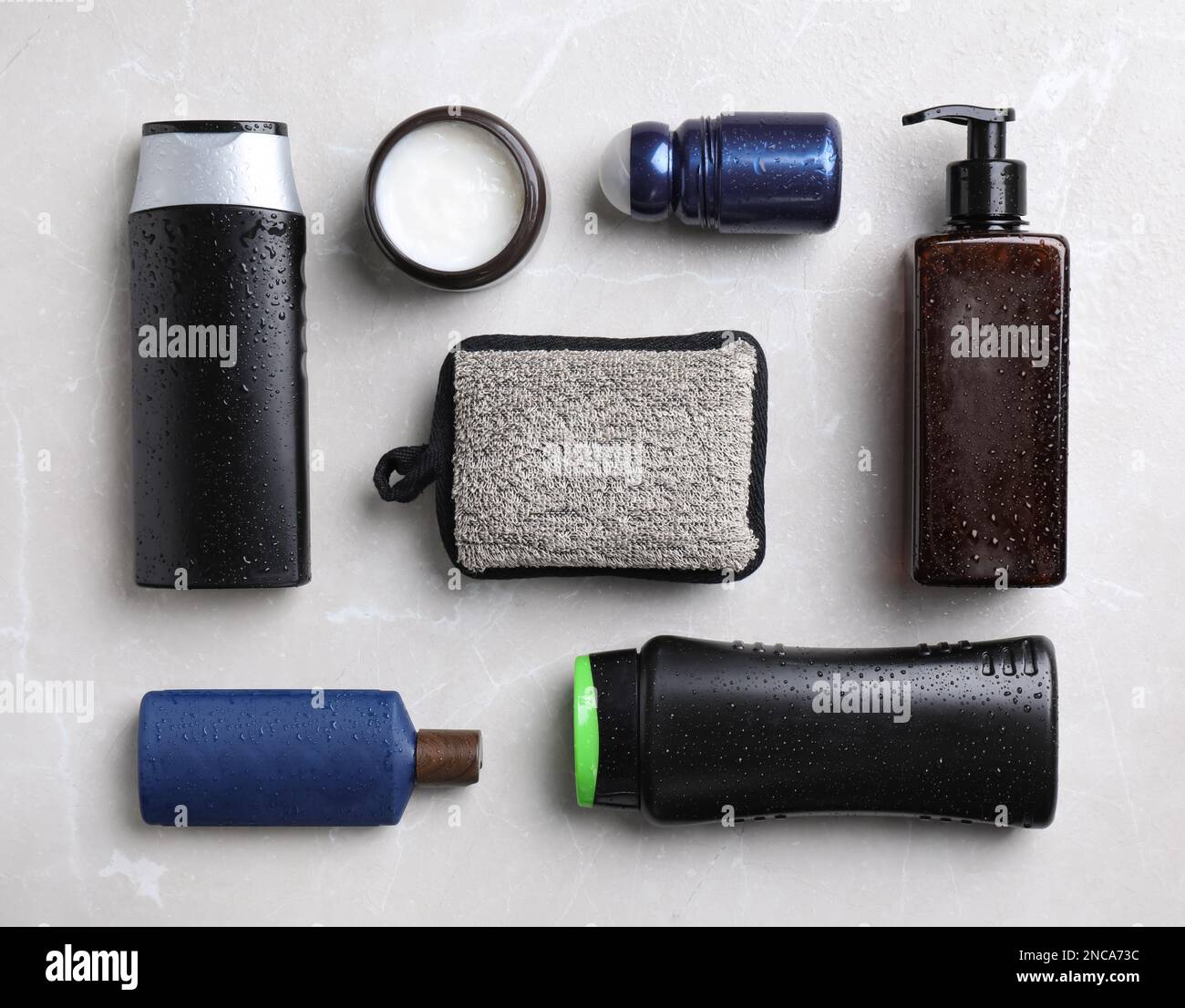 Flat lay composition with men's cosmetics on light grey marble ...