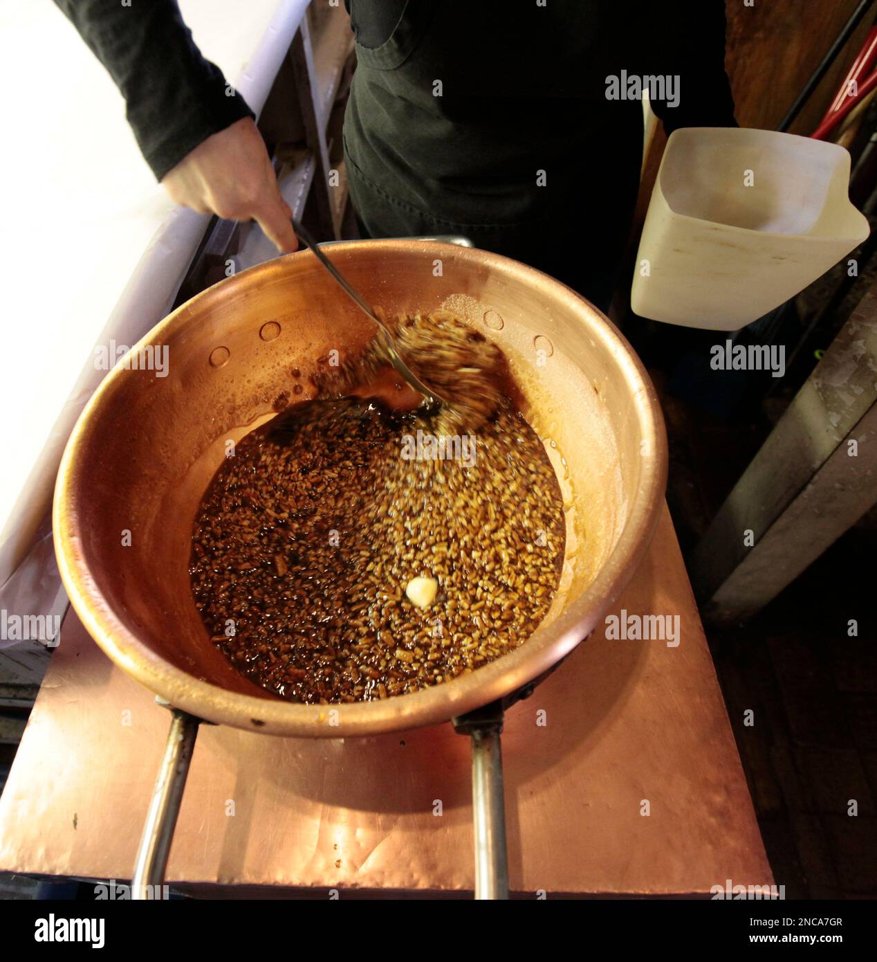 Jaye Cuccia, owner of Evans Creole Candy Factory Inc., makes pralines