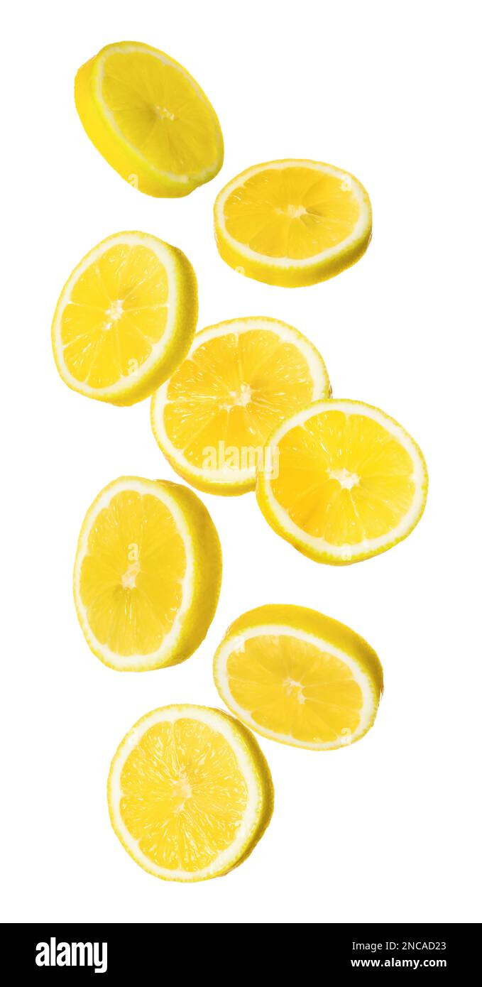 Fresh ripe lemons falling on white background Stock Photo Alamy