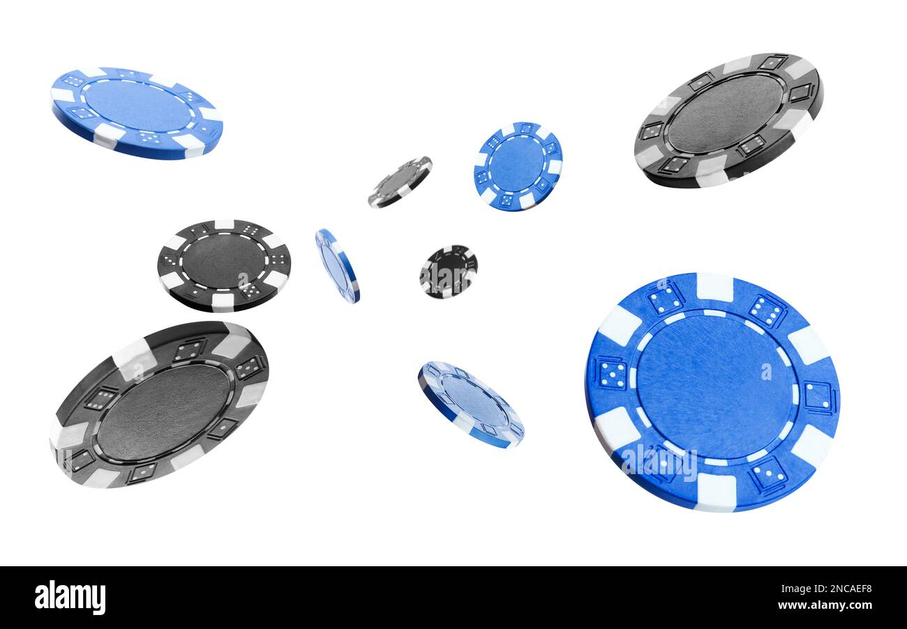 Different casino chips falling on white background Stock Photo Alamy