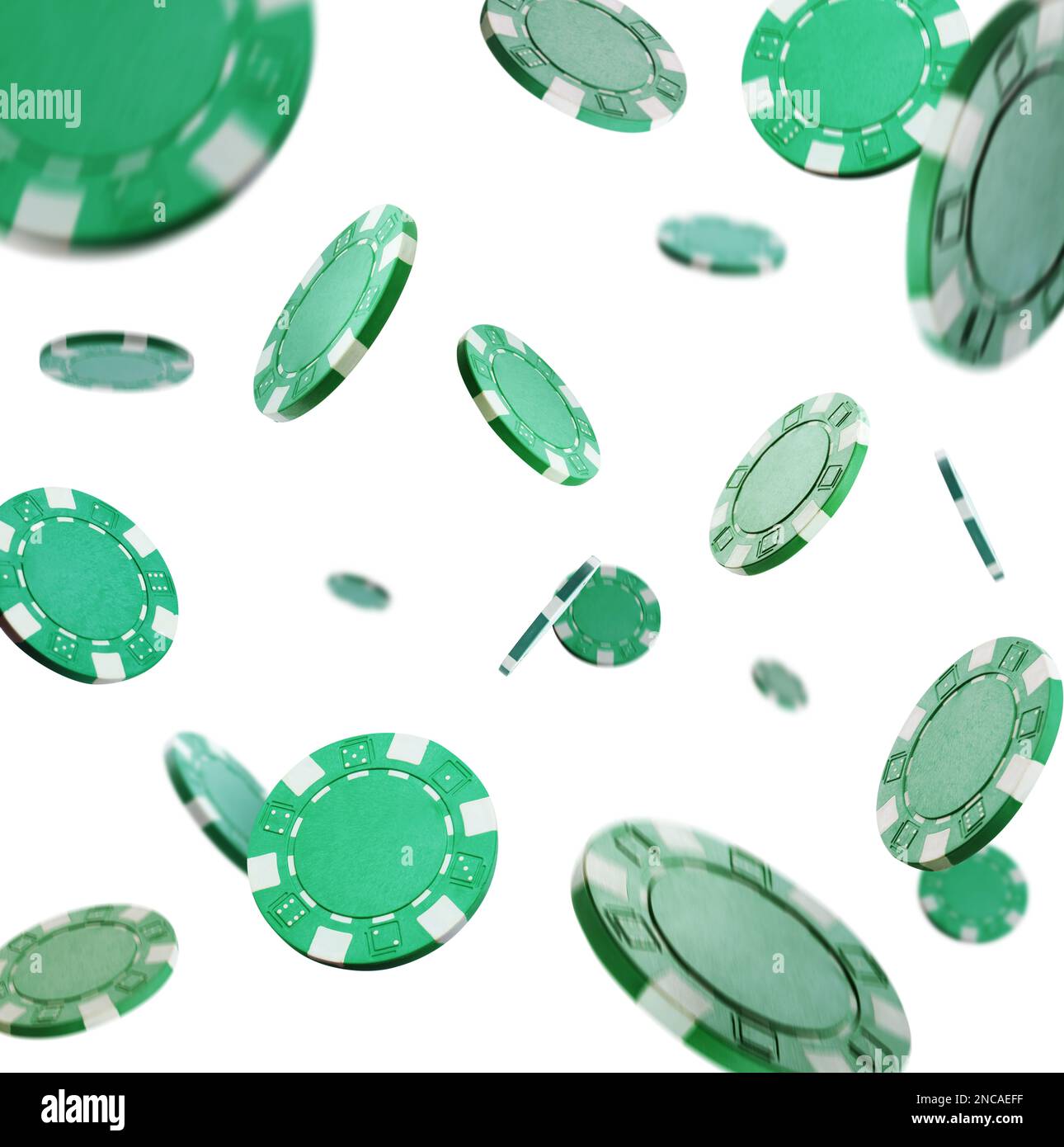 Green casino chips falling on white background Stock Photo Alamy