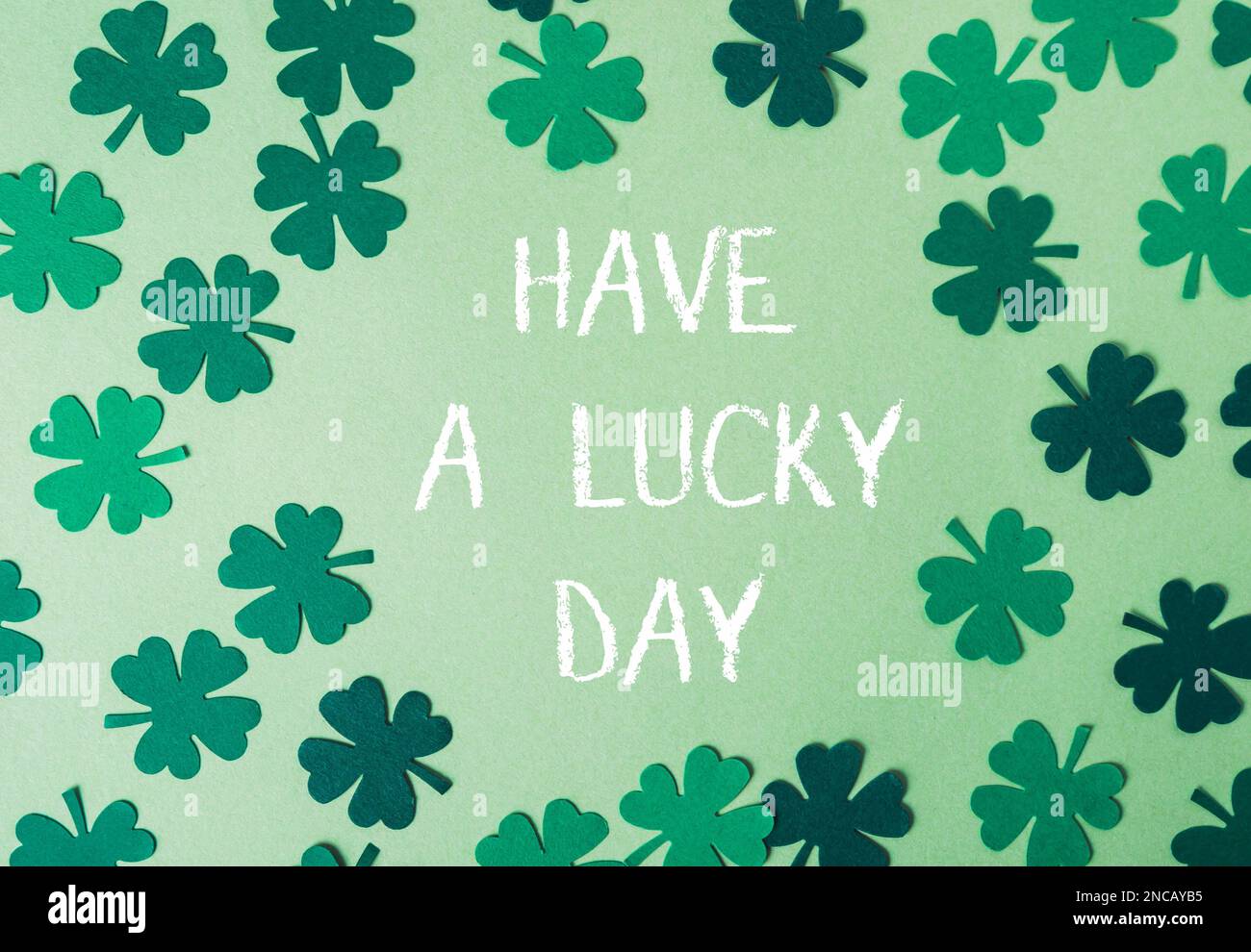 Have A Lucky Day on a green background Stock Photo - Alamy