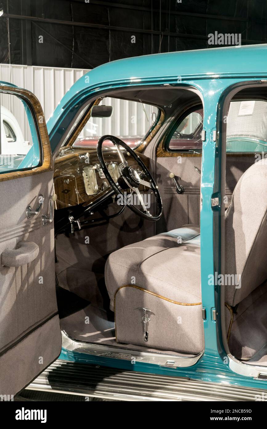 The art deco dashboard, steering wheel and front seat of a 1937 Chrysler Airflow at the Northeast Classic Car Museum in Norwich, New York. Stock Photo