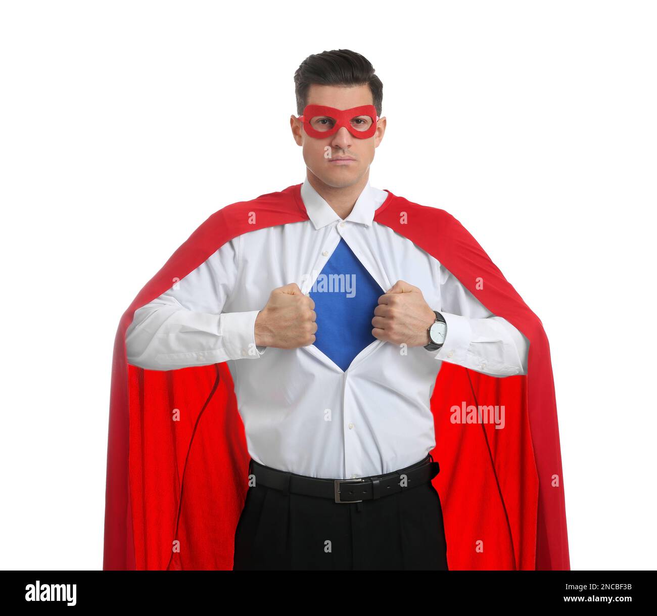 Businessman in superhero cape and mask taking shirt off on white background Stock Photo