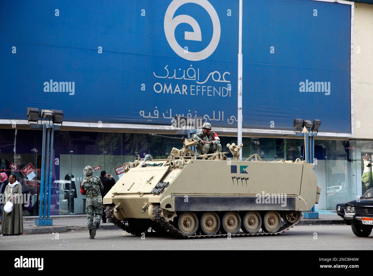 An Egyptian army armored personnel carrier is seen outside a department