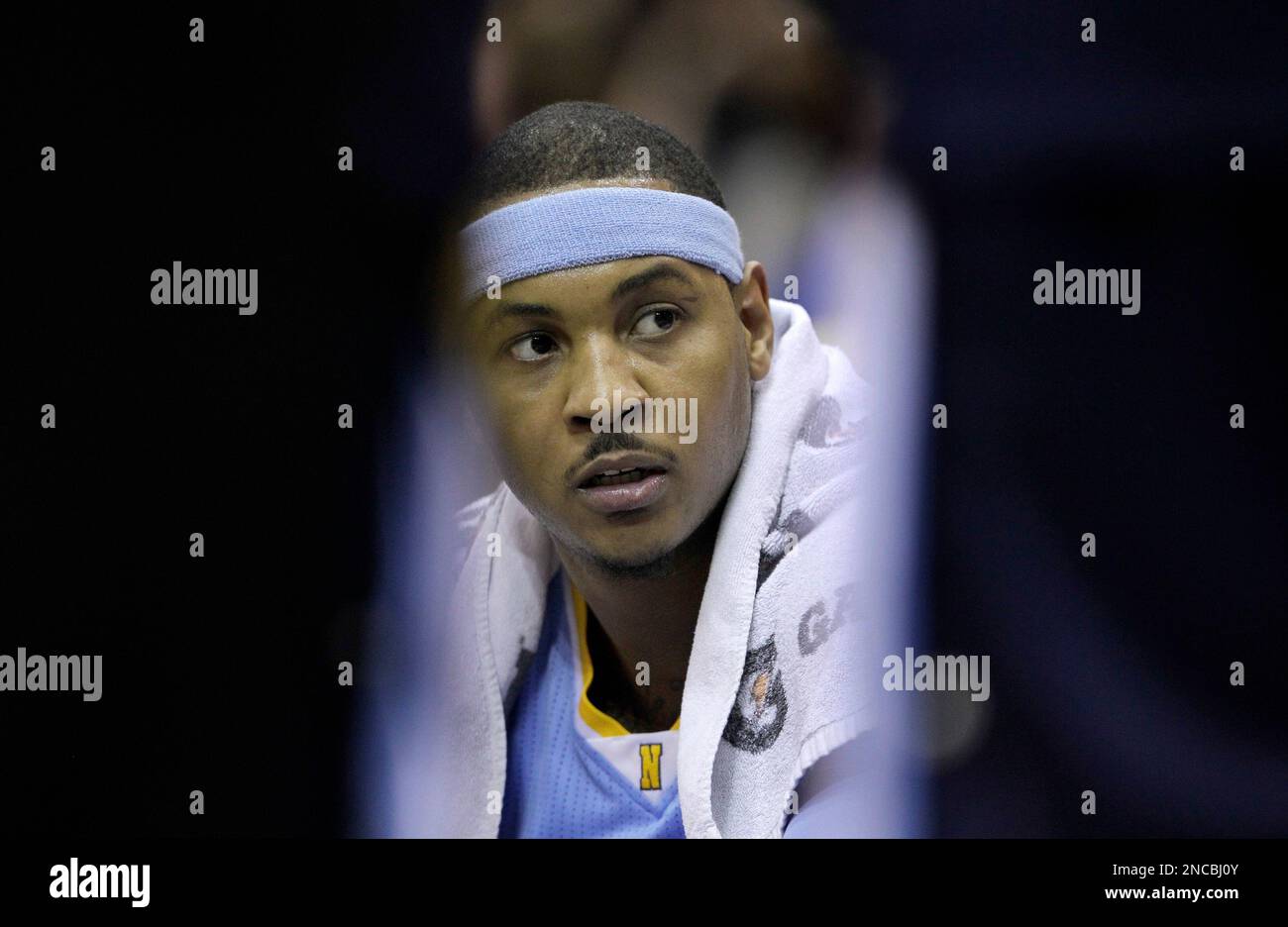 Carmelo Anthony of the Denver Nuggets sits on the bench against the  Portland Trail Blazers on January 31 2006 at th…