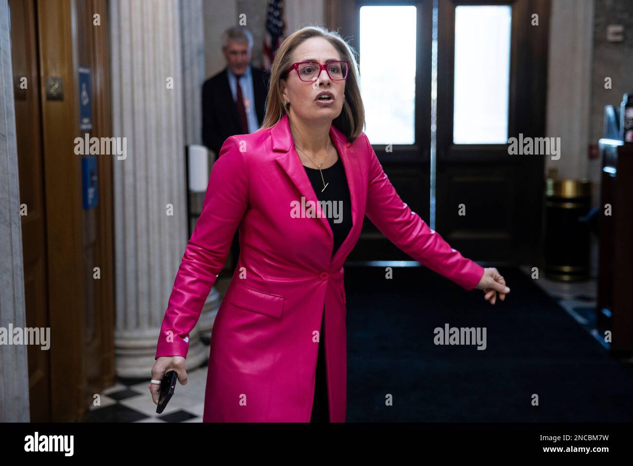 Sen. Kyrsten Sinema (I-Ariz.) speaks with reporters as she departs a ...