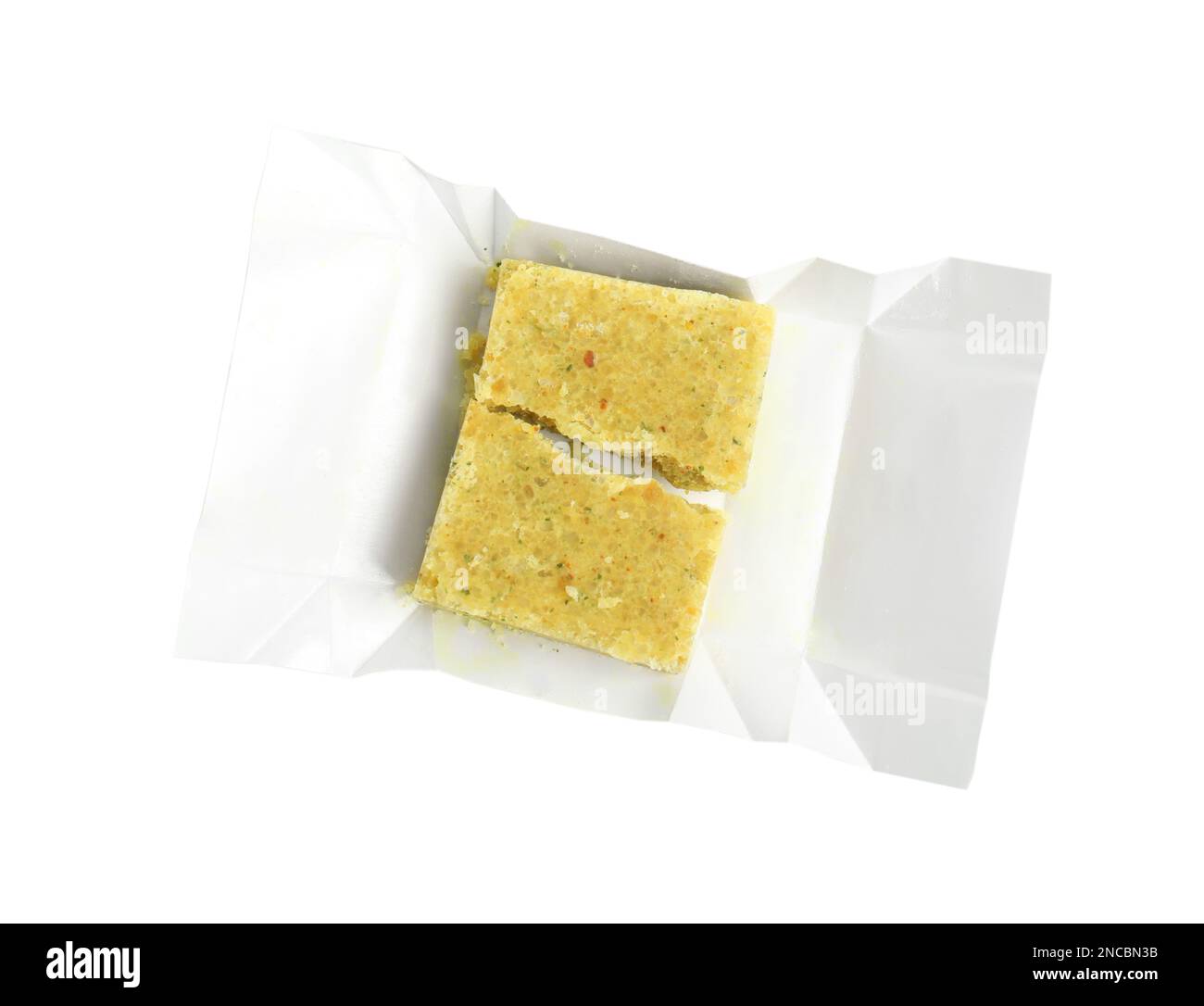 Unwrapped bouillon cube on white background, top view Stock Photo