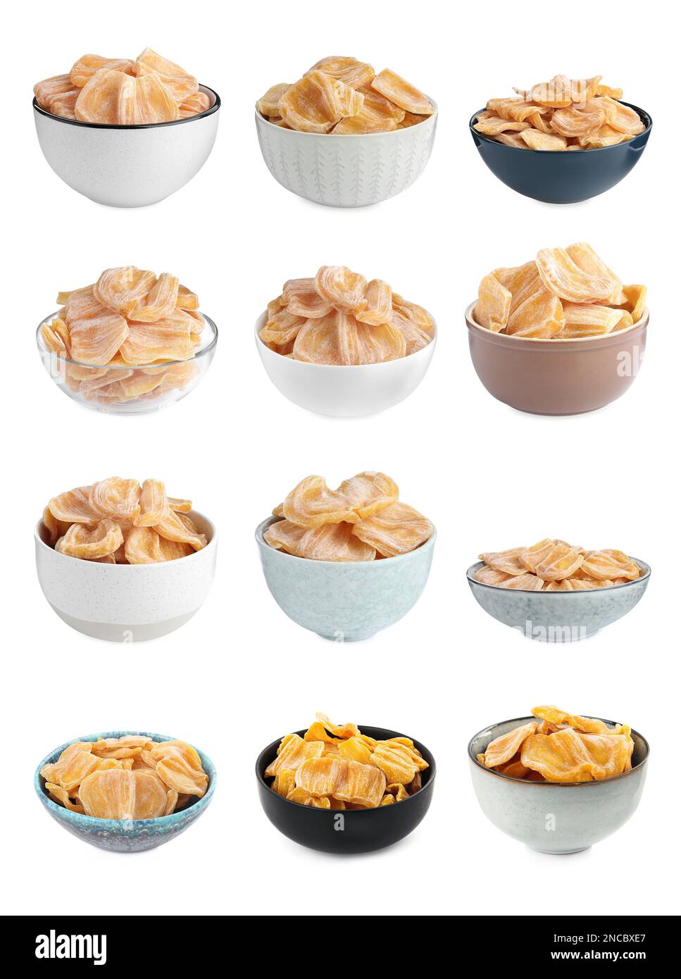 Set with sweet dried jackfruit slices in bowls on white background Stock Photo