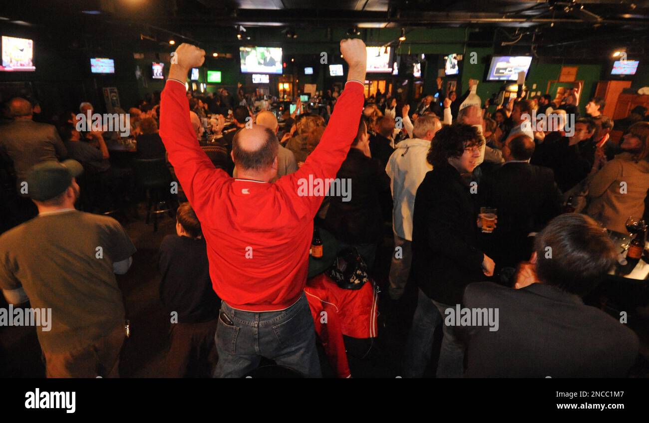 Supporters for Omaha Mayor Jim Suttle celebrate at an election night