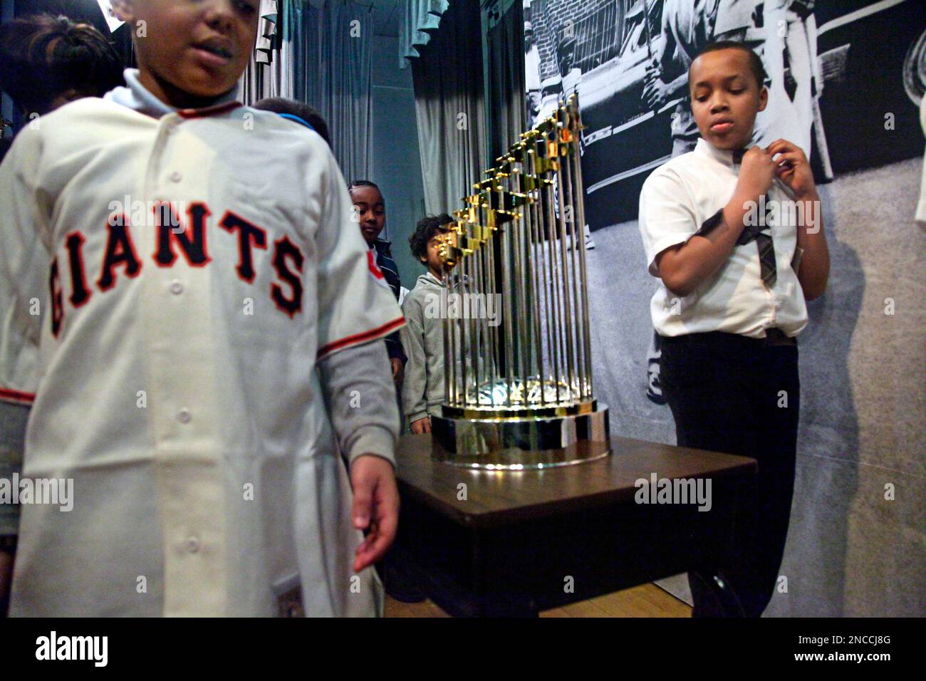 https://c8.alamy.com/comp/2NCCJ8G/students-at-the-arthur-tappan-school-ps-46-in-harlem-file-past-the-the-giants-2010-world-series-trophy-after-posing-for-photos-on-friday-jan-21-2011-in-new-york-the-middle-school-is-near-the-site-of-the-old-polo-grounds-where-the-giants-played-before-the-team-moved-to-san-francisco-in-1957-ap-photobebeto-matthews-2NCCJ8G.jpg