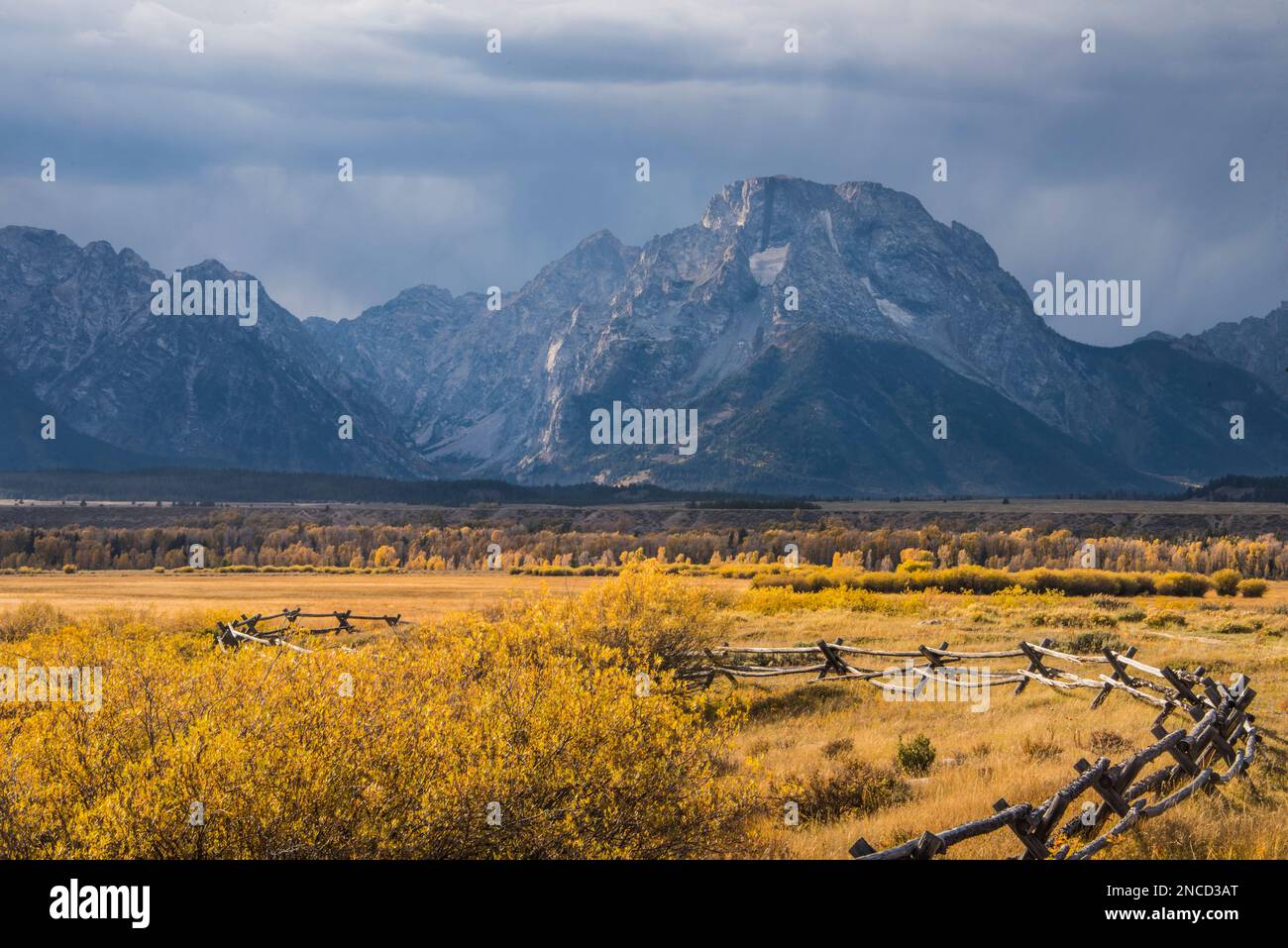 A storm clears over the Teton Range and Mt Moran as seen from historical Cunningham Cabin, Grand Teton National Park, Wyoming, USA Stock Photo