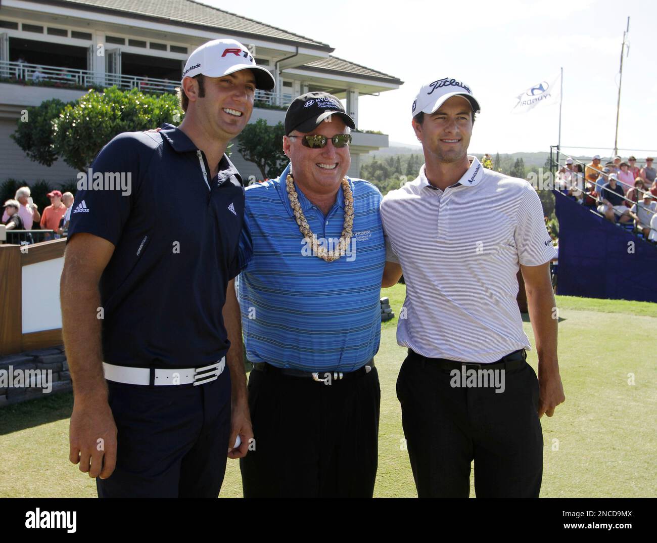 From left Dustin Johnson, Gary Planos and Adam Scott pose on the first ...