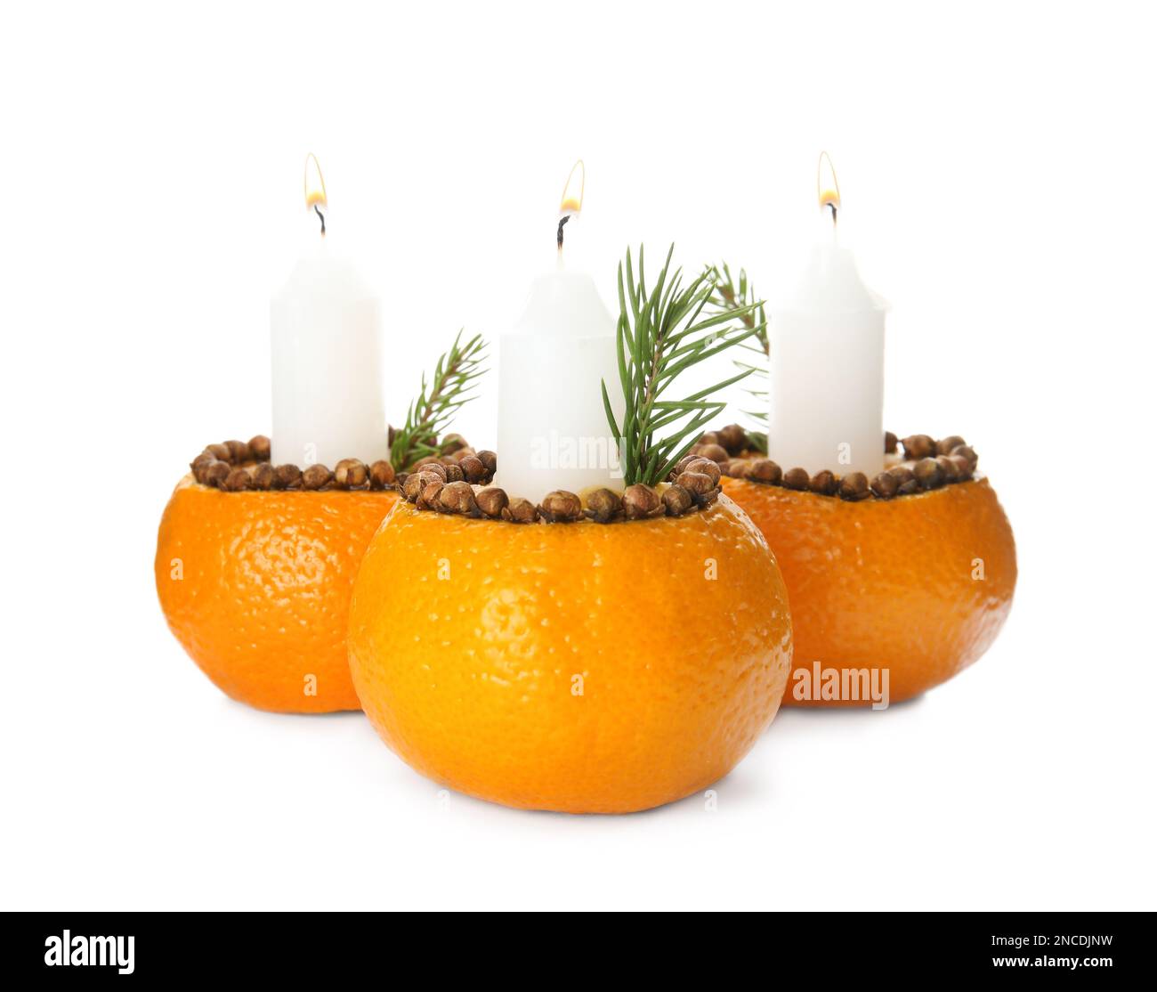 Candles in tangerine peels as holders on white background Stock Photo ...