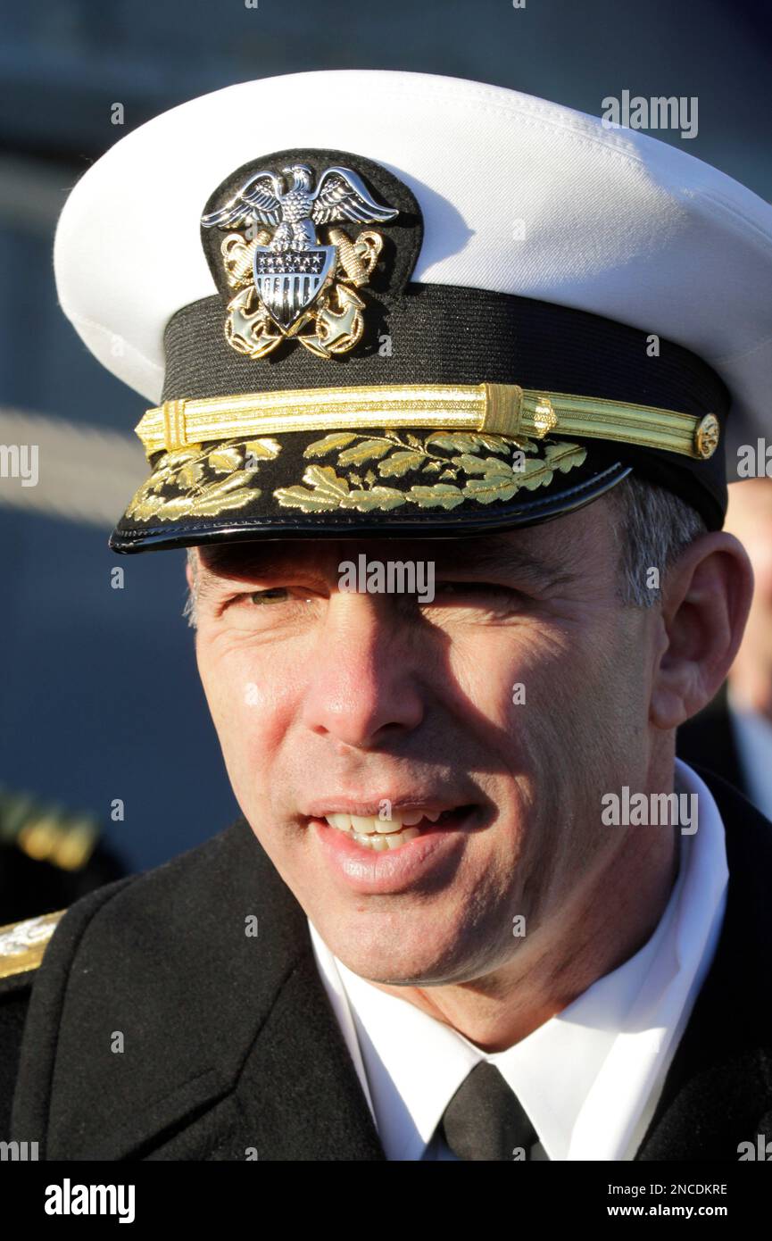 Commander of Carrier Strike Group 12, Rear Adm. Terry B. Kraft, talks to the press as the