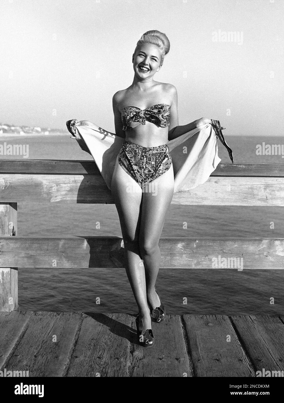 Lucky Long Beach, California, Spectators were given a preview of the 1949 bathing  suit when beauteous Bette Alden modeled this French convertible with a  South Sea touch on Nov. 19, 1948. Created