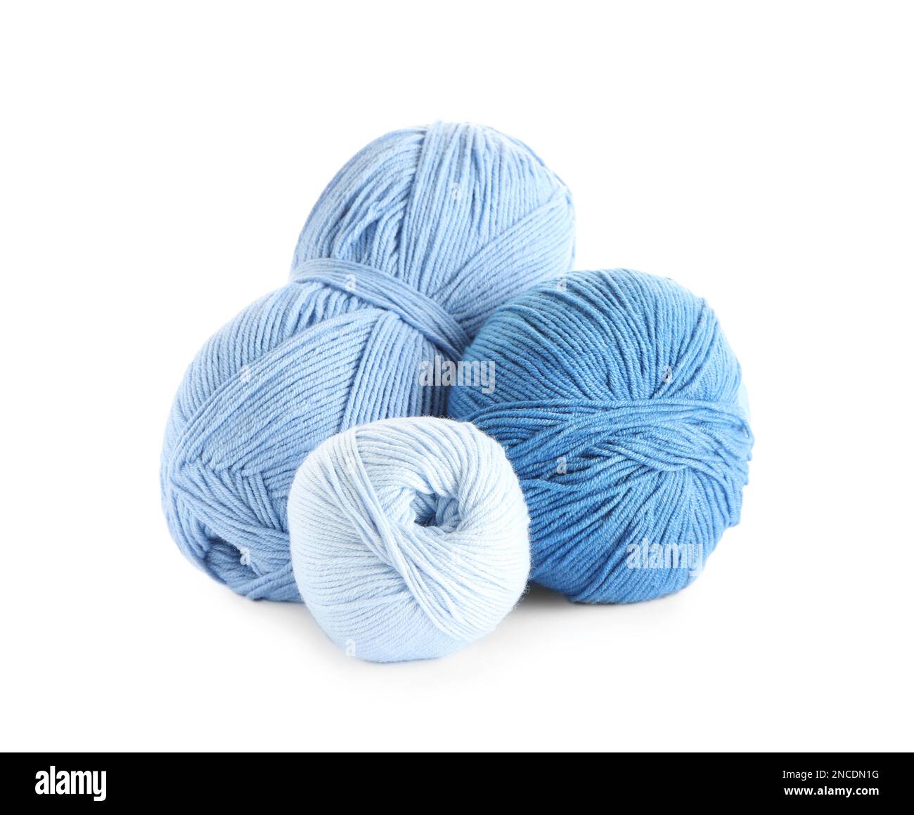 Different soft colorful woolen yarns on white background Stock Photo