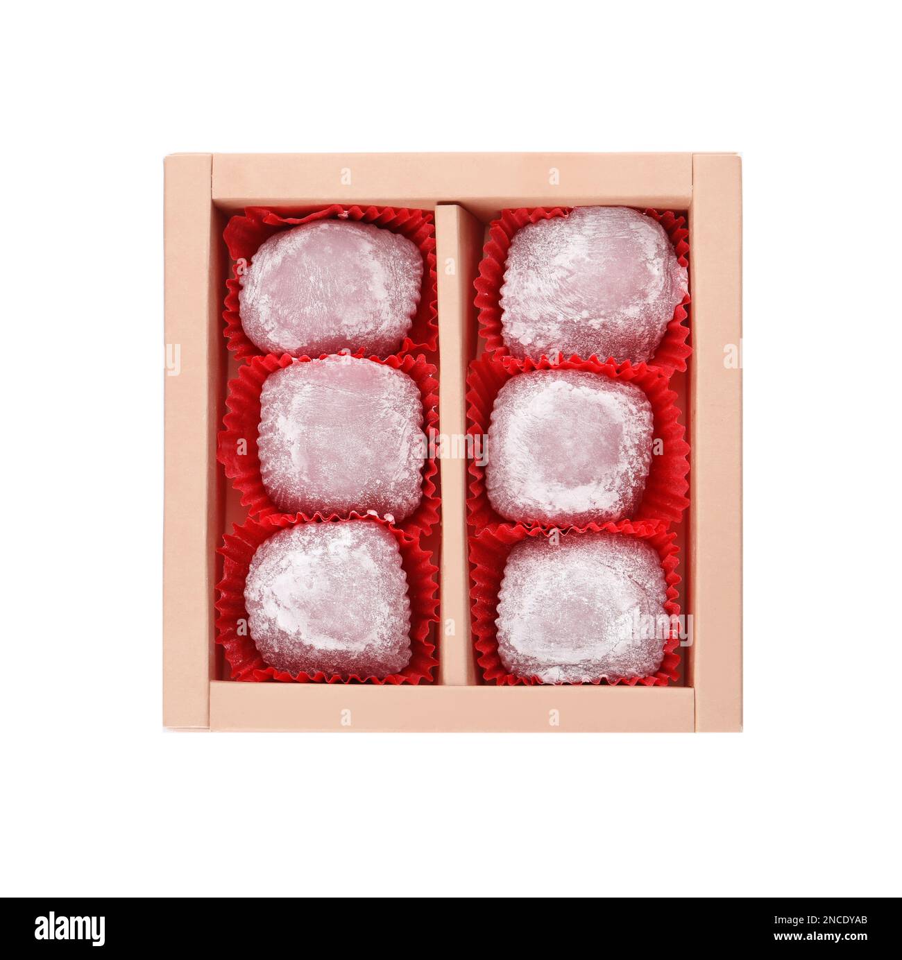 Box with delicious mochi on white background, top view. Traditional ...