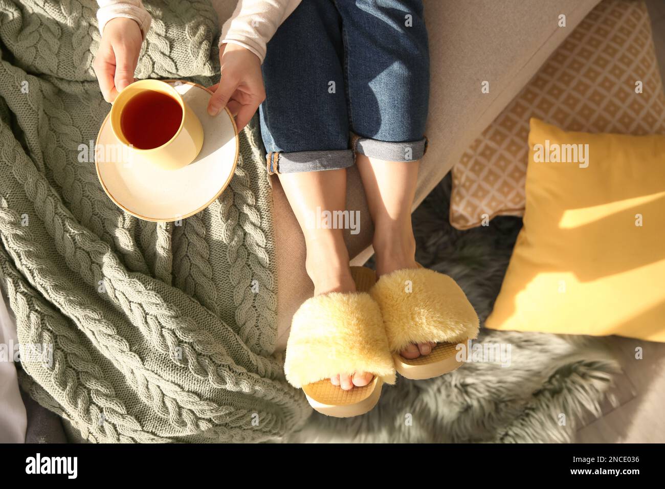 Cup of tea and slippers hi-res stock images - Alamy