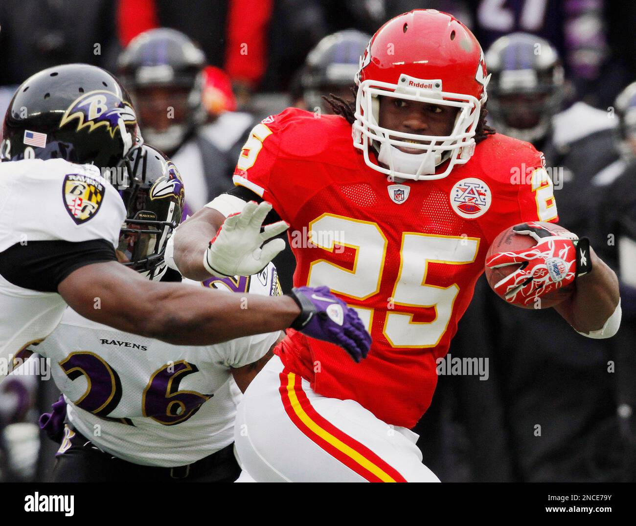 Kansas City Chiefs running back Jamaal Charles (25) gets past Baltimore ...