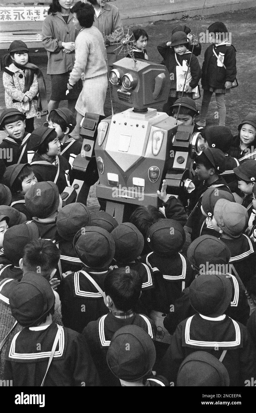 Goro, a five foot robot developed by a toy research firm, is surrounded